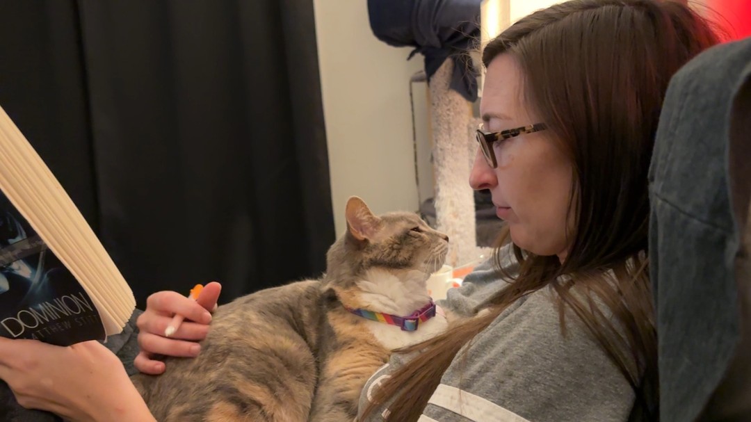 I often talk with clients about photos and the pressure they feel to either avoid the camera or pose a certain way.
It's important to remember why you want to take a photo in the first place. For example, I love candids like this one of me reading with my Sammy. She has many wonderful years ahead, but I cherish photos like this to look back on someday. This picture reminds me of the countless hours we've spent snuggled up reading together, filling me with nostalgia and warmth.
I'm not against selfies, but if your camera roll is full of images meant to curate a specific image without capturing a meaningful event or memory, it might be worth reconsidering. You are not here to look a certain way. If you want to snap a pic of how you look today in your bathroom mirror, go for it. Just make sure you're not setting yourself up for unnecessary self-criticism.