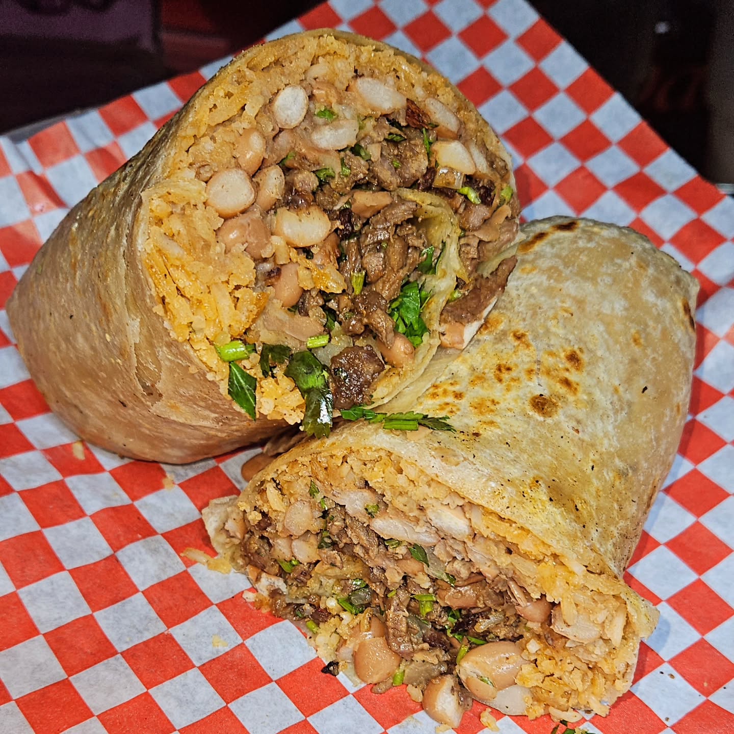 Hungry? Try a burrito. Super hungry? Try a Cali-Burrito 😉 🌯
.
.
.
.
.
#nightmarket #tacos #burrito #burritos #818food #thevalley #la #foodies #elchaparritotacos #mexicanfood