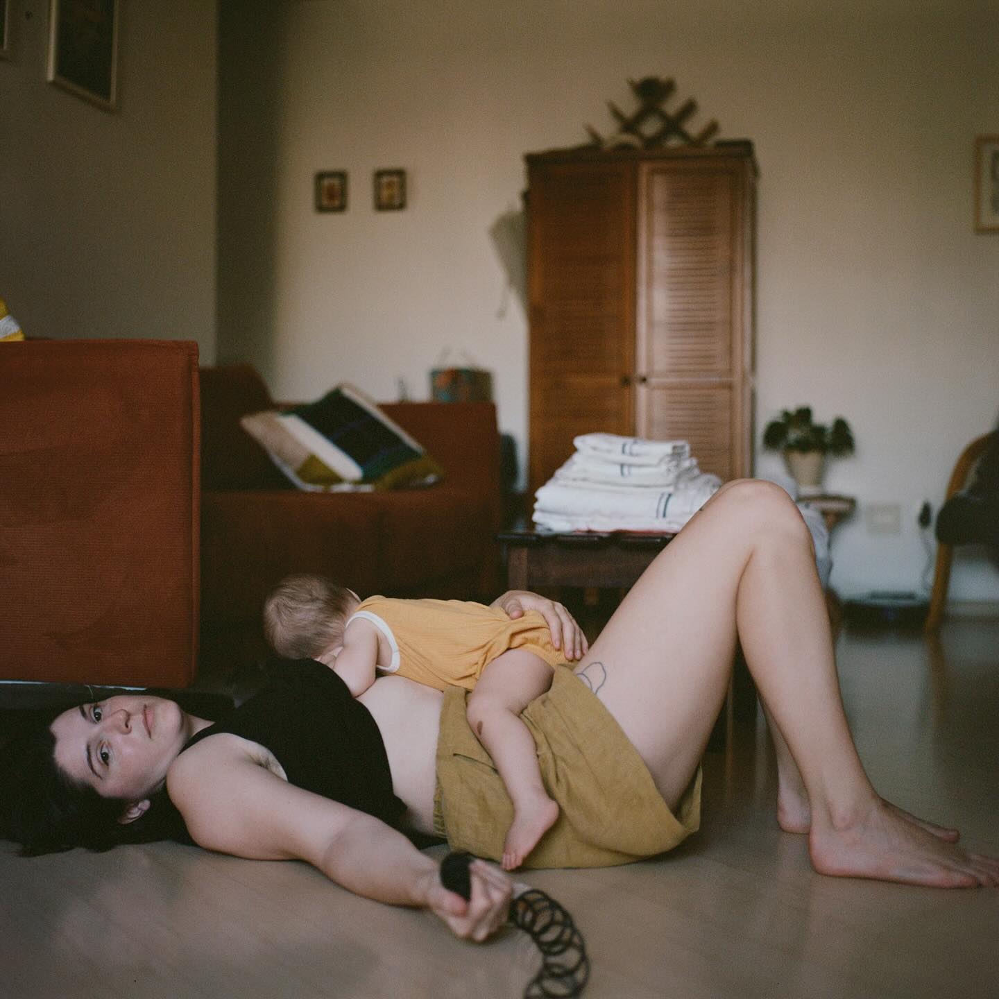 Kat Shannon (@katshannon) is an artist and educator working across photography, text, and video. Driven by the desire to continually examine the complex role photography plays in our lives, culture, and collective memory, her work uses the image as a tool to explore notions of intimacy, connection, and community. She is currently based between São Paulo, Brazil, and Orlando, Florida. In 2017 Kat co-founded the collaborative artist collective Memory Foam through which she curates exhibitions, publishes and collects artists’ books and zines, and produces an artist interview series called “Artists Eat Ice Cream.”
“These two self-portraits are part of an ongoing work which examines motherhood and queer family building. In these images I use the camera as a mirror and shared gaze to witness myself in the roles I carry as both an artist and mother to my young daughter. I am interested in photography as a tool to create as much as to document, and with these pictures I engage in the long lineage of self-portraiture in order to reclaim, with both autonomy and ambivalence, the home and domestic sphere.” - Kat Shannon
Check out Kat’s work and others in the Self-Portrait 2 issue of Pearl Press at pearl-press.com/self-portrait2
-
#pearlpress