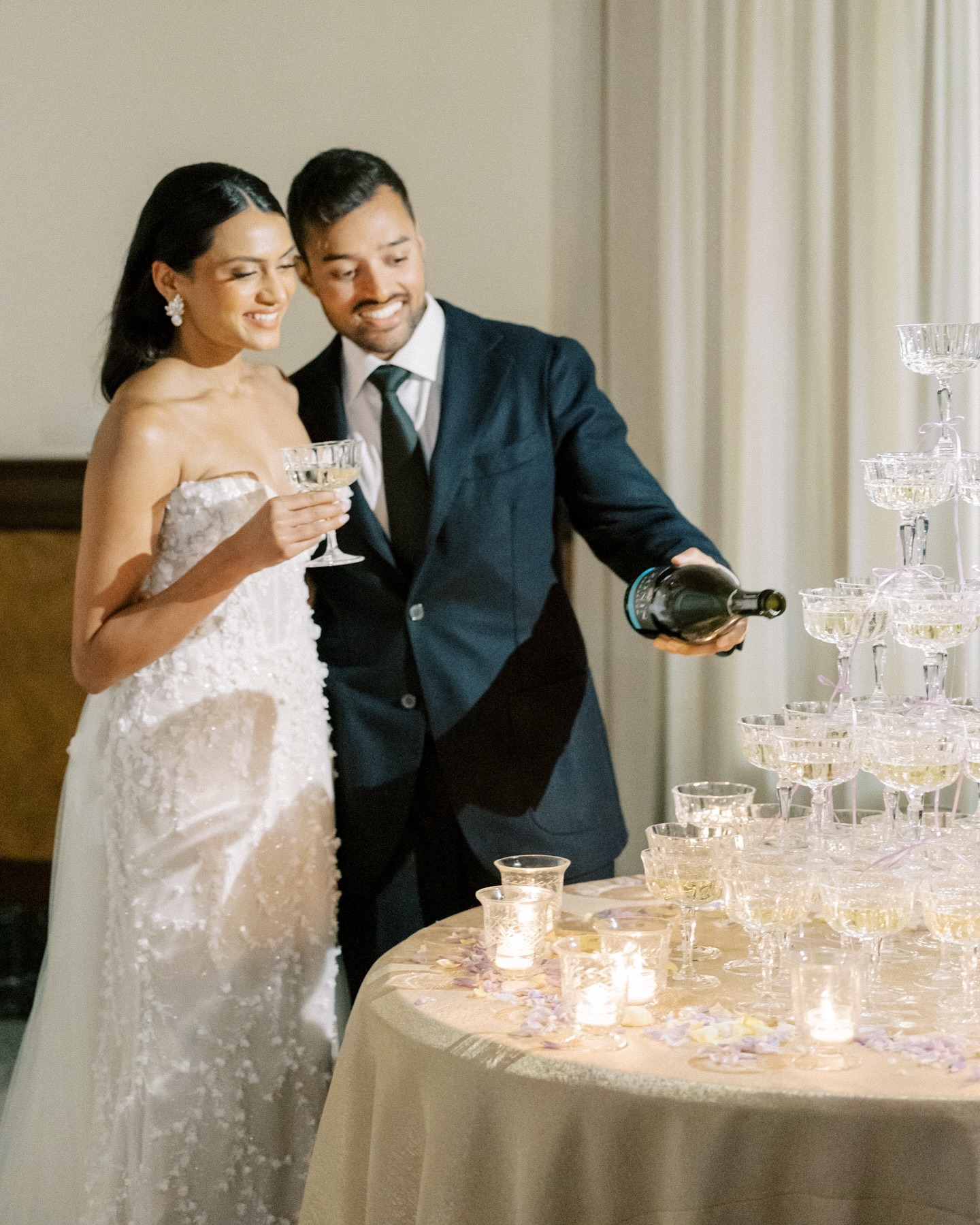 Celebration at its finest 🍾 There’s nothing I love more than a good old fashioned champagne tower and a toast to the bride and groom 🥂
.
.
.
#parisweddingphotographer #pariswedding #weddingphotography #destinationweddingphotographer #destinationwedding #italyweddingphotographer #parisphotographer #weddingphotography #paris #fineartcuration #luxurywedding #luxuryweddingphotographer #Italyweddingplanner #fineartweddingphotographer #nycweddingphotographer #italywedding #stylemepretty #lakecomoweddingphotographer #franceweddingphotographer #weddingreception #weddinginfrance #weddinginparis #italy #mariage #franceweddingplanner #bostonweddingphotographer #fineartwedding #editorialweddingphotographer #weddingreception
.
.
.
Photography @vsphotography_insta
Venue | Villa Aura del Lago | @auradellago
Workshop Host | AMV Retreats | @amv_retreats
Wedding Planning, Styling & Design | AMV Weddings | @amv_weddings
Educators | Sophie Kaye @sophiekayephotography | Andreas K. Georgiou @andreaskgeorgiou | Storybox Cinema @storyboxcinema
BTS Photography | Konstantyn Zakhariy | @konstantynzakhariy
BTS Videography | Storybox Cinema | @storyboxcinema
Florist | Flowers Living | @flowersliving
Cakes | Erzulie Cakes | @erzuliecakes
Furniture/Tabletop Rentals | Tableset | @tablesetrentals
Linens | Nuage Designs | @nuagedesignsinc
Stationary | Laura Elizabeth Patrick | @lauraelizabethpatrick
Hair & Makeup | Madeline Eleanor | @bymadelineeleanor
Couple | Anjali & Pooran | @anjali_1 @pooranvp
Ceremony Dress | Monique Lhuillier @moniquelhuillierbride by White House Bride @white_house_bride
Ceremony Veil | Enaura | @enaurabridal @enauraaccessories
Hair Accessories | All About Romance | @allaboutromancebridal
Ceremony Earrings | Megan Therese | @megantheresecouture
Ceremony & Reception Shoes | Bella Belle | @bellabelleshoes
Reception Dress | WONA Concept | @wonaconcept
Reception Earrings | White Jasmine | @whitejasmineaccessories
Ring Boxes | The Styling Reserve | @thestylingreserve
Flat Lay Styling Mats | Olive & Oak | @oliveandoakmat
Flat Lay Styling | Sophie Kaye | @sophiekayephotography