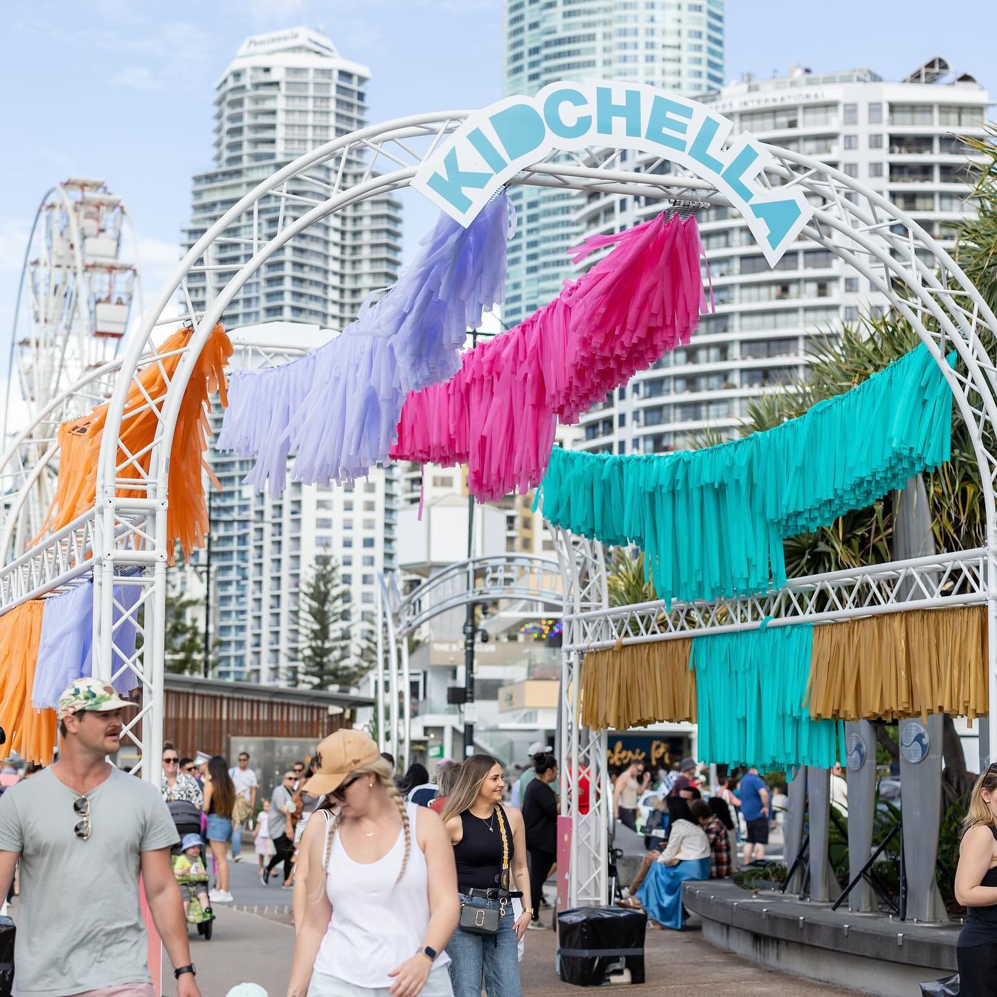 To cap off July we worked with the team from @cityofgoldcoast to deliver Event Theming for the inaugural edition of Kidchella, hosted on the Surfers Paradise foreshore. To capture the vibrancy and atmosphere of the Coachella-inspired brief we utilised our new white truss system to create an elongated tunnel arch that was adorned with colourful fringe and custom Kidchella signage. The structure provided a colourful contrast to the Surfers Paradise skyline and signalled excitement was ahead to guests of the free family event. 🎡🌈