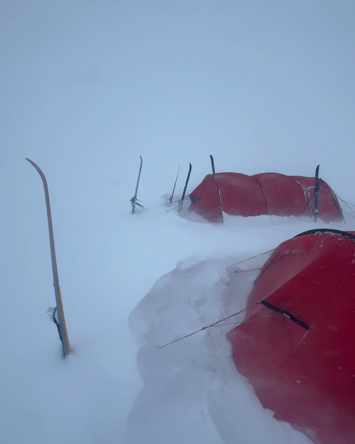 Week 4 in Greenland ☺️
Week 4 was my final week crossing Greenland and I could now understand why only around 1000 people had ever managed to cross this country. 🦾🤯
Ever since we had summated the 2600m ice cap during week two, we had been skiing through a constant sastrugi field which resembled a choppy, frozen ocean with seemingly endless undulating waves. This was not the norm with sastrugi fields usually only lasting a few miles. However, these beautiful ice sculptures were being carved out of the ice by a huge storm we were shadowing, and hauling our gear and food through the undulating sastrugi field was slowly draining our energy reserves and by week four, our gear was feeling the strain too.
To get a feel for what it was like, imagine skiing over 15 miles a day (a total of 160 odd miles), pulling two heavy sledges up and down rocky, ice-covered coastlines in windy, sub-zero temperatures and you’ll have a good idea of the last two and half weeks for us in Greenland. 😮💨
It was tough but undeniably beautiful terrain to ski through, keeping you on your toes and often leaving you mentally tired by the end of a long days hauling.
However, by week four of living with our old sastrugi friend, we also knew that we were descending back down towards sea level and our final goal of the east coast. We were getting giddy. 😝
We pushed hard, skiing further and further each day hoping we could make our helicopter rendezvous date as planned and by week 4, we had been skiing for 27 continuous days so although a little tired, I felt fit and part of a slick camping and skiing machine of a team. ⛺️
Week 4 also included our last day. One of the craziest days of my life so far. 👀 More on that in my next post…
Greenland is epic to the extreme and amongst the pictures of one of our evening toilets and Taylor helping me fit my trusty down shorts as it dropped to a very windy -36c, I hope these pictures somewhat demonstrate that.
#greenlandcrossing #adv #expedition #epicness #nordicskiing #fsgs #kidneytransplantrecipient #wearerab