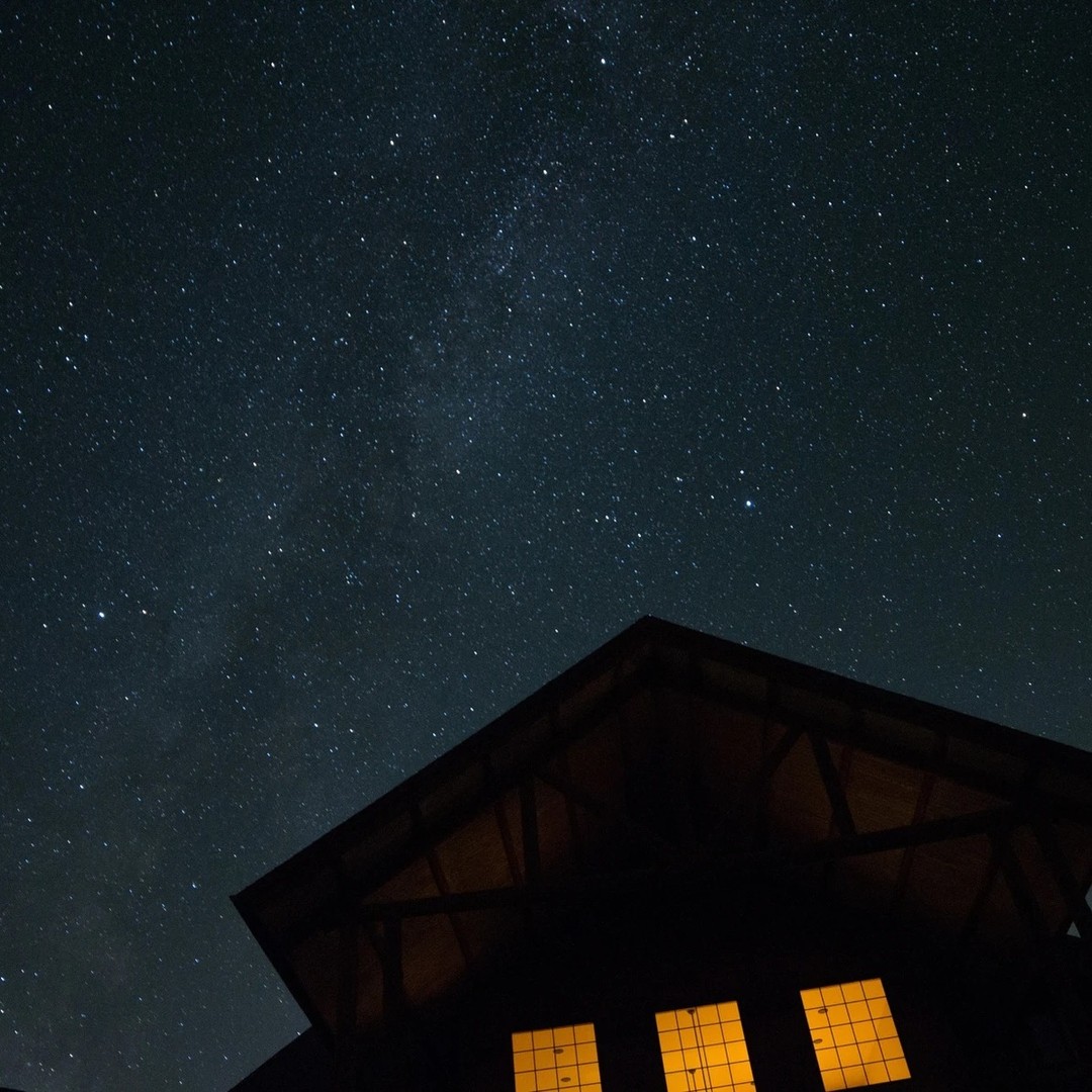 "A full harvest moon, golden and still,
Falls without motion toward a dim horizon
Outlined by shadowy rooflines, dark trees."
-Dark Early Morning
by Rick Kuenning