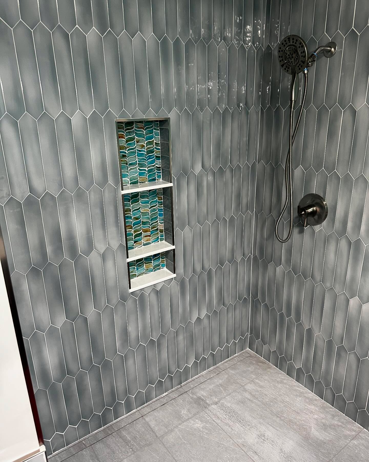 Just needs to be painted and the medicine cabinet to come in. This barrier free shower was different from the typical showers we do. I love the elongated hex and the glass in the niche. Glass door incoming as well.
#tile #bathroom #remodel #bathroomremodel #barrierfree #ada #nocurb #curbless #geneseeceramictile #kimbletile