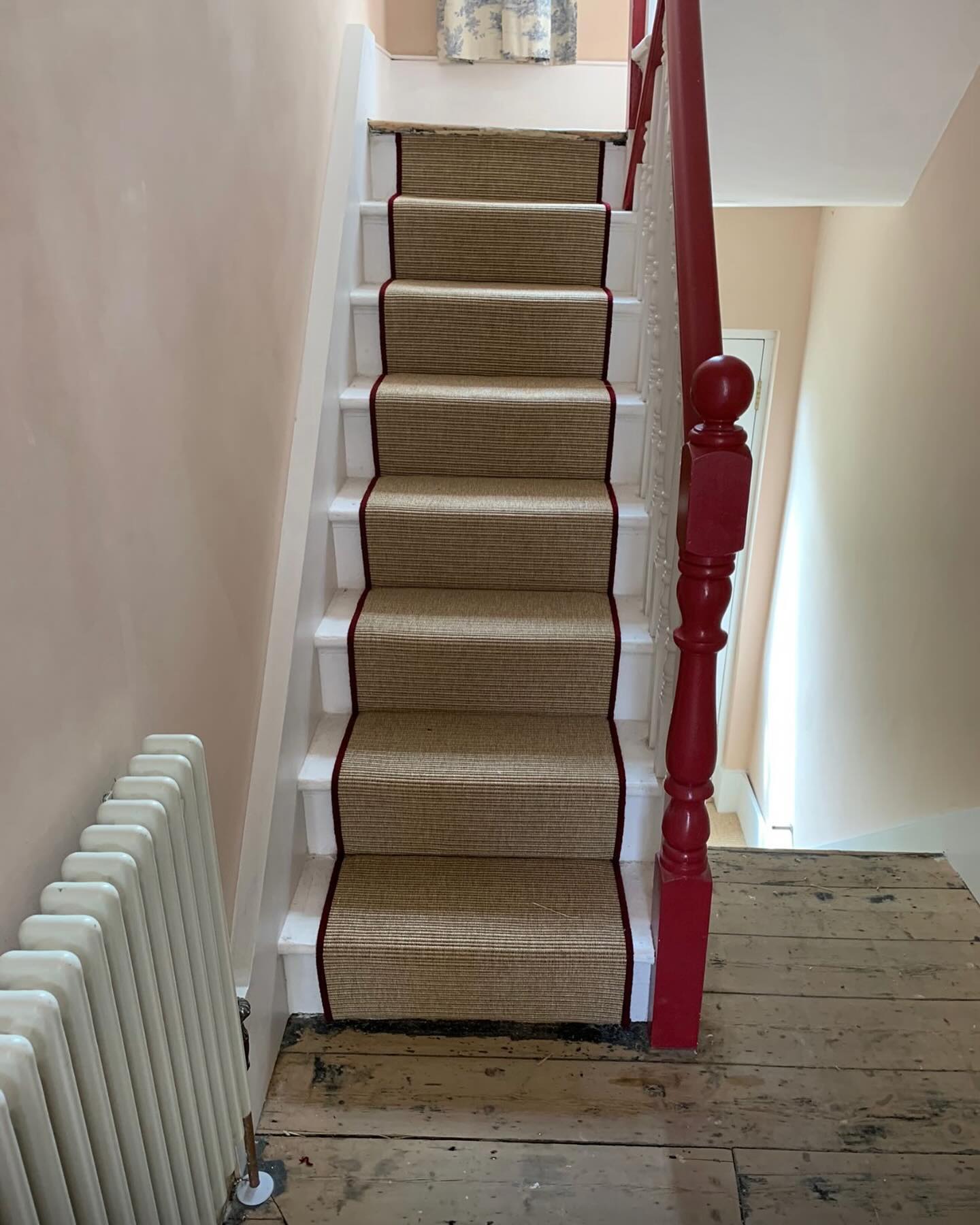Unnatural Flooring Company natural faux sisal stair runner with wine whipping to match banister handrail laid to Bermondsey home.