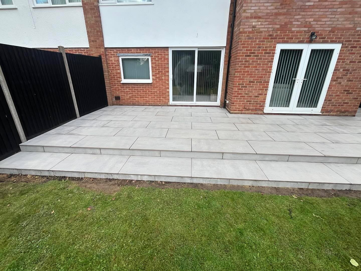 Porcelain patio completed with black grout #alderson #building #landscaping #patio #porcelain #andanotherone