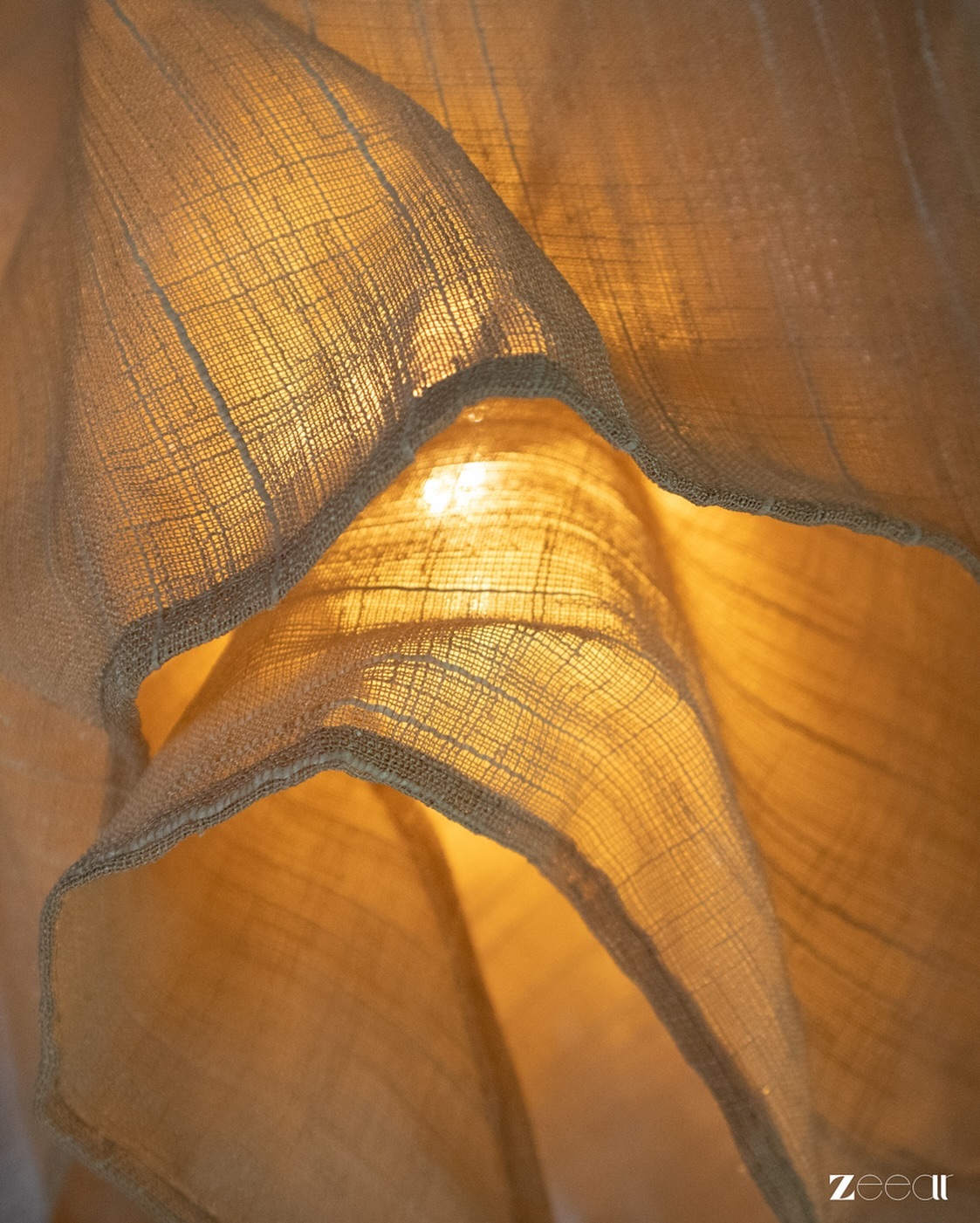 Love the way light spills through the fabric, creating a beautiful, delicate glow. 💫