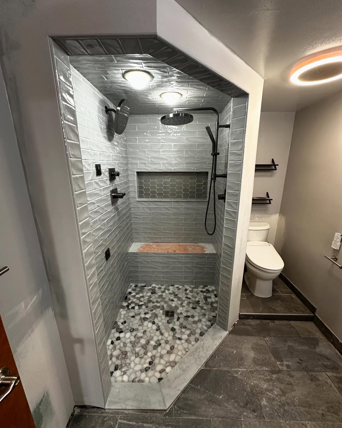 Awaiting the bench top and shower doors, but this project is finally getting there! Handheld/Rainhead Shower System along with Body Sprays. Next up in a couple months is the bathroom floor. This project is proof why you hire someone who knows what they’re doing. Before these homeowners purchased their home, someone with zero know how redid the bathroom and caused more harm than good. But we got it all fixed up for them. Pictures to follow once it’s completely wrapped.
#tile #bathroom #remodel #shower #subwaytile #subway #kimbletile #schluter #durock #virginiatile #homedepot #homeimprovement