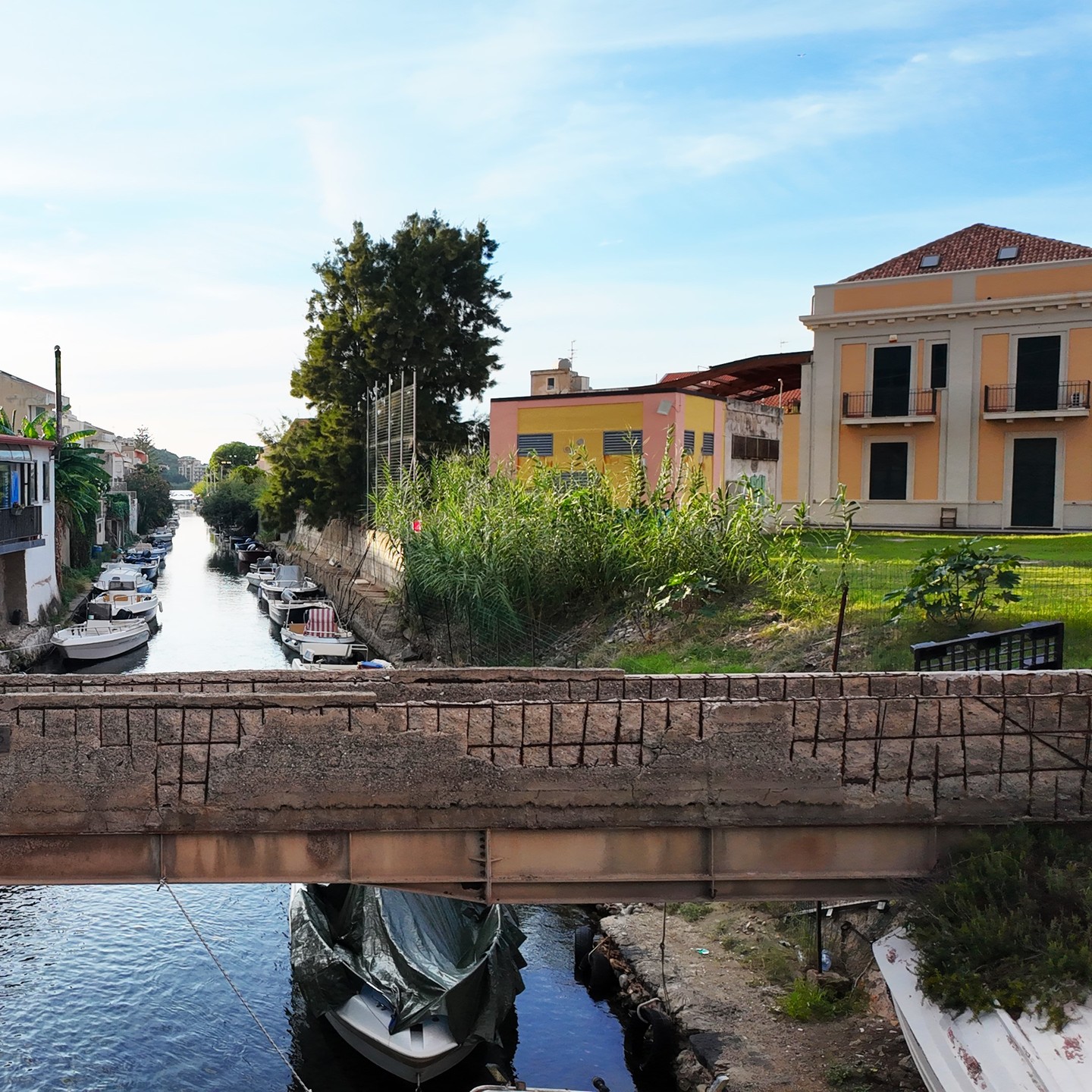In Torre Faro, this canal quietly links the lake with the waters of the Strait of Messina. Lined with the boats of local fishermen, it’s a place where tradition lives on. Located near the main square and church, this simple scene captures the authentic rhythm of village life.
.
.
.
#TorreFaro #TorreFaroLake #CapoPeloro #VisitCapoPeloro #Messina #VisitMessina #Sicily #VisitSicily #FishingVillage #VillageCharm #AuthenticSicily