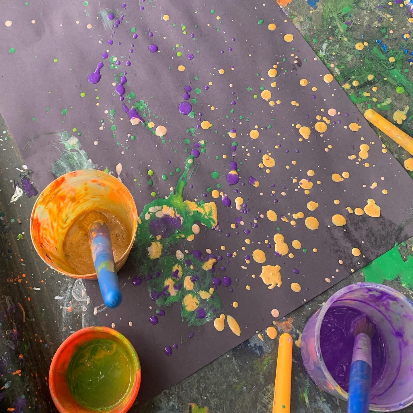 Today the children made Jackson Pollock styled firework paintings by flicking lots of colourful paint on black paper! Super effective artwork! 🎇 #fireworks #jacksonpollock #outdoorpainting #craft