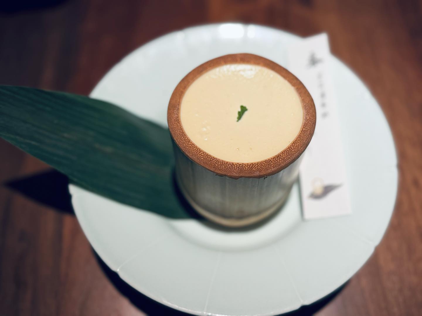 The first session of our course, Aesthetic Paths to Flourishing, begins tomorrow! We are so excited to share this journey with a group of creatives who, like us, are drawn to beauty in their everyday lives.
As I prepared for this course, I had a small yet nourishing experience that brought a sense of calm to my week. It was early evening in central Beijing, and the city was alive with people rushing home, bikes and scooters zigzagging through traffic, forming a vibrant chaotic energy. After some wandering, we found a quiet restaurant and bar hidden between buildings. The moment we stepped inside, I was taken by the warm lighting and earthy colors—it was simple, but there was something about the whole atmosphere that felt so grounding.
We sat around a small wooden table, and I noticed even the smallest details—hand tissues and menus—reflected a simple, natural design, embodying the essence of Eastern aesthetics. There was beauty in the subtlety, a quiet elegance. Each dish had a poetic name and was crafted from seasonal ingredients. The desserts we tried, jasmine tea mousse and lily cheesecake, were inspired by the seasons—spring and winter—and tasted as gentle and pure as they looked. 🍵
I also ordered a pear rose white tea, which came in a handmade pot with a tiny cup. As I poured, the soft aroma of rose and pear filled the air. Before drinking, I took a moment just to appreciate the scent. Each sip had layers—a delicate sweetness, a warmth that felt calming. The entire experience felt like a reset, a pause from the week’s noise. It was as if the beauty around me softened everything, leaving me feeling more connected and less weighed down by my to-do list.
Eastern aesthetics have always drawn me in, especially their subtle power. There’s a depth to them, a need to slow down and be present to fully appreciate the beauty. It felt like a much-needed antidote to our fast-paced world, a reminder that beauty doesn’t have to shout to be heard; sometimes, it’s in the quiet moments that we find the most peace. 🍃
@bella_zhang_16
@aesthetics_research_lab
#aesthetics #art #nature #beauty #onlinecourse #easternculture #senses #wellbeing #calmness #reflection