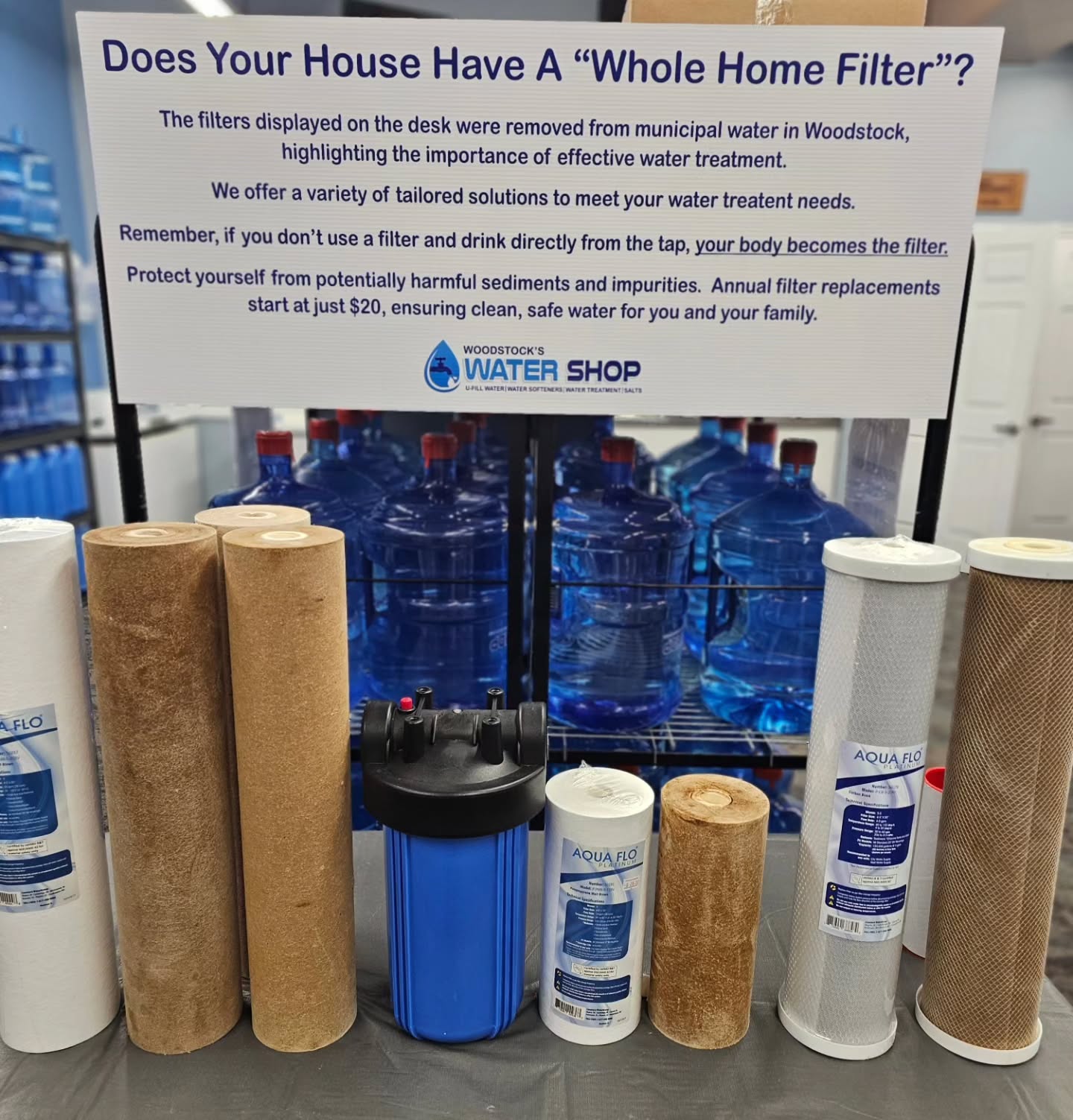 I would like to share a post highlighting the challenges associated with Woodstock's municipal (city) water. The treatment facilities work diligently to make the water safe for consumption by essentially recycling wastewater and purifying it. However, the process does not fully eliminate all contaminants. As demonstrated by these filters, they become stained with dirt, oils, and other debris. These filters must be replaced annually to maintain water quality.
Our sign says the following.
"The filters displayed on the desk were removed from municipal water in Woodstock, highlighting the importance of effective water treatment.
We offer a variety of tailored solutions to meet your water treatment needs.
Remember, if you don’t use a filter and drink directly from the tap, your body becomes the filter.
Protect yourself from potentially harmful sediments and impurities. Annual filter replacements start at just $20, ensuring clean, safe water for you and your family.”