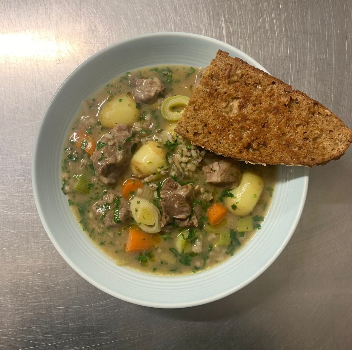 Total winter warmer. Perfect with a glass of red at lunch! Lamb neck Irish stew, black treacle soda bread.