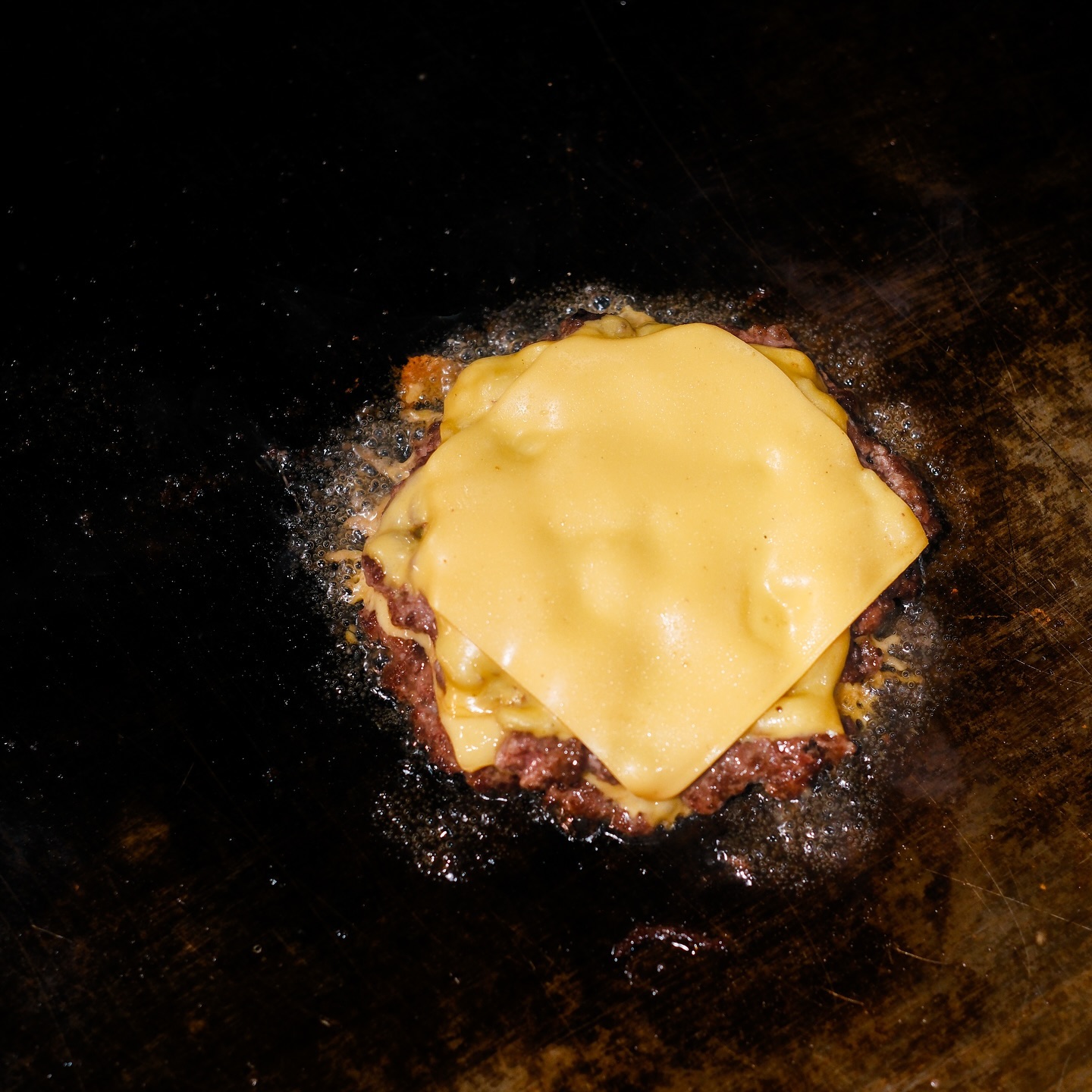 It’s impossible to make a smashburger without American cheese.