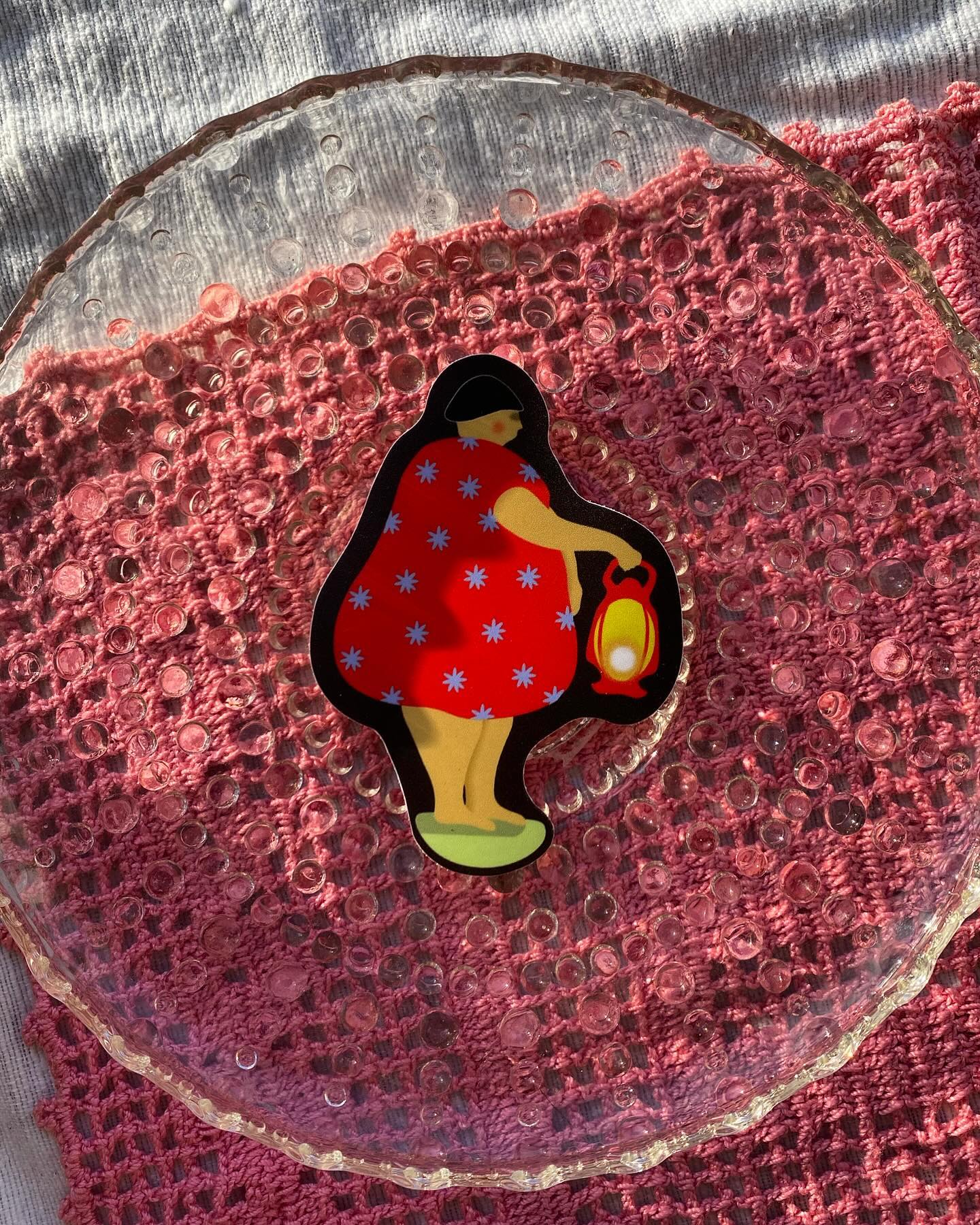 🕯️GUIDE🕯️
This sticker is one of my favorite things I made in 2024. Some see a strawberry queen. I intended her to be an emblem of stepping into darkness and uncertainty. Not necessarily boldly or bravely, but because it is the way you need to go.
When I made her I was thinking about my female ancestors, and especially my grandmas. They experienced war, heartbreak, child birth and loss, isolation, financial insecurity…and carried their lights forward anyway. Showing the way for their entire family with the special gifts and creativity that only they possessed.
This is a thing ordinary humans (especially women) have done always, without any special reward or attention. And it is a thing that you and I can do also, even in these particular dark and uncertain times.
If you’d like a guide sticker to accompany you, you can find her on my website ❤️