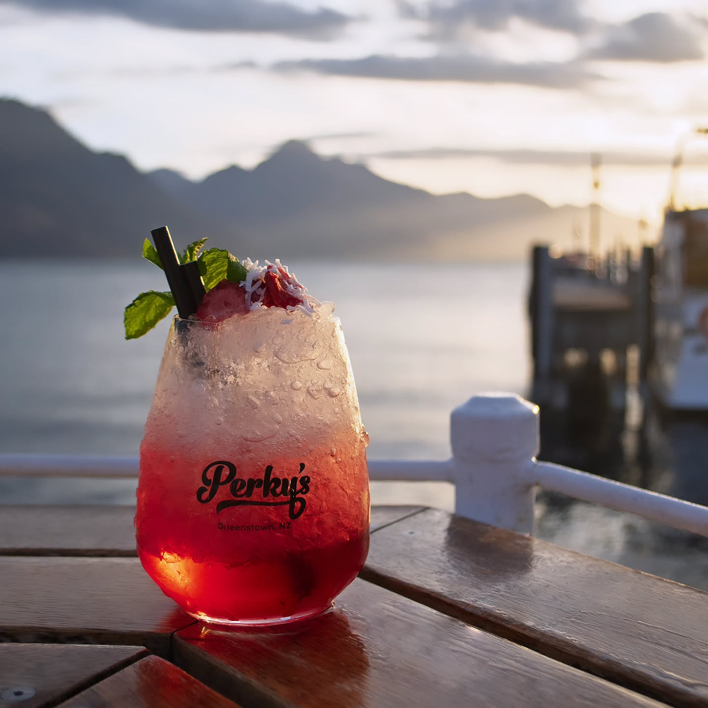 ☀️ Finish off your sunny day with a refreshing Malibu Crush and sunset views at Perky's! 🌅🍹