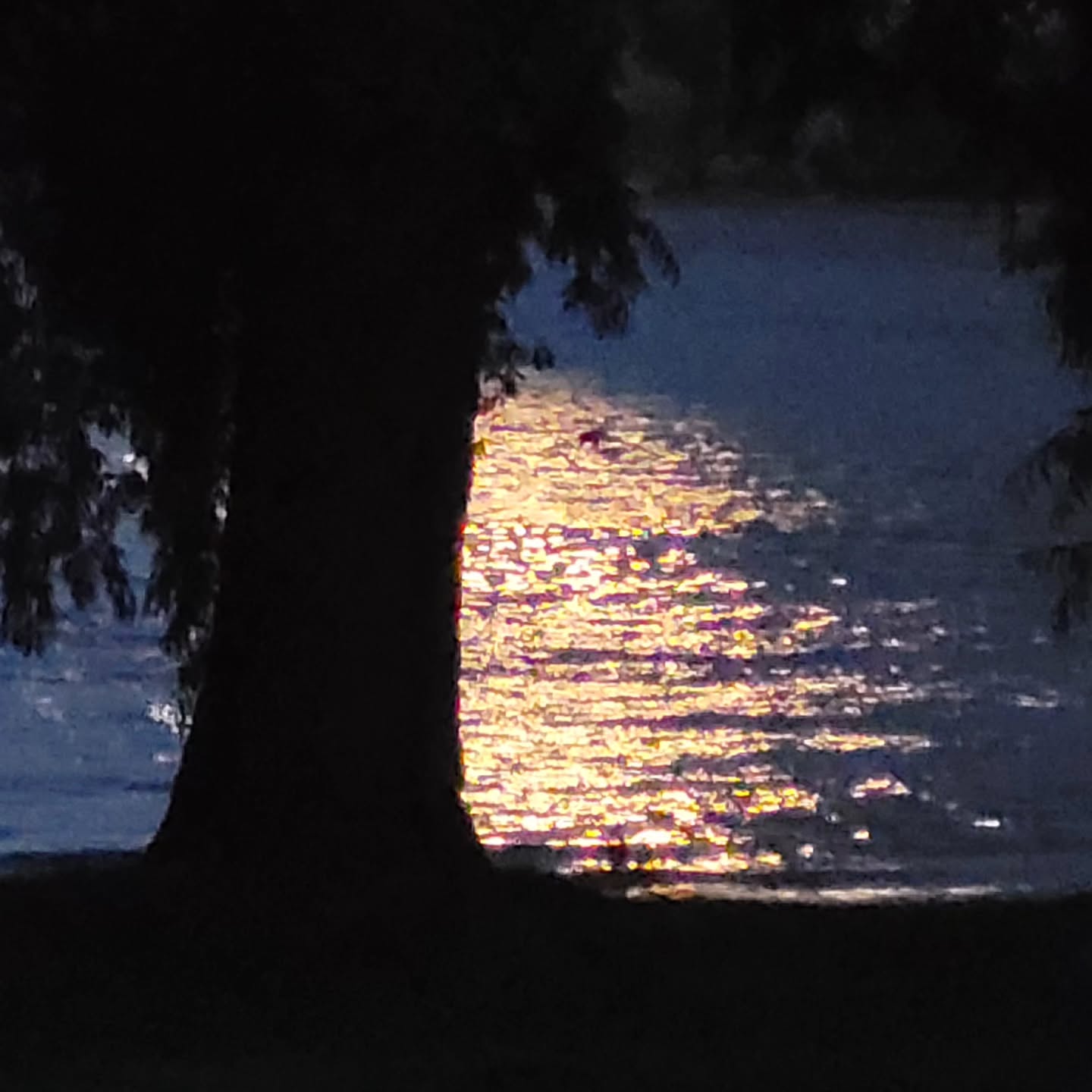Full moon reflection at Glendu Bay,