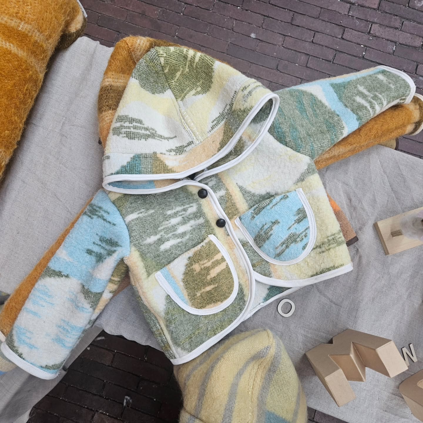 NEW! Snuggle up in our handmade jackets, crafted from 100% recycled wool. No two are the same—each one is unique!