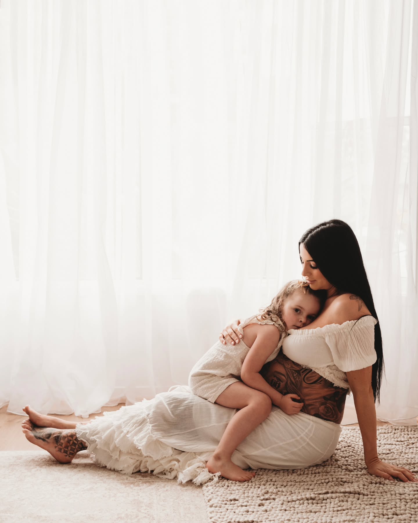 There’s something deeply comforting about cuddling with your children on a rainy day. The soft patter of raindrops against the windows creates a gentle, rhythmic backdrop that seems to slow the world down. Wrapped in a cozy blanket, with little arms tucked around you and warm heads resting on your chest or shoulder, time feels suspended in a bubble of peace and love.
The outside world, grey and wet, fades into the background as the room glows softly with warmth—maybe from a cup of hot chocolate nearby or the faint hum of a story playing in the background. Laughter bubbles up in quiet moments, and there’s space for stillness, for shared silence, and for the wordless exchange of love that only close cuddles can offer.
In these moments, the rain is no longer a nuisance. It becomes a gift—a reason to slow down, draw closer, and simply be together.
#pregnancyphoto ##sydneyfamilyphotographer
@jaydelewin