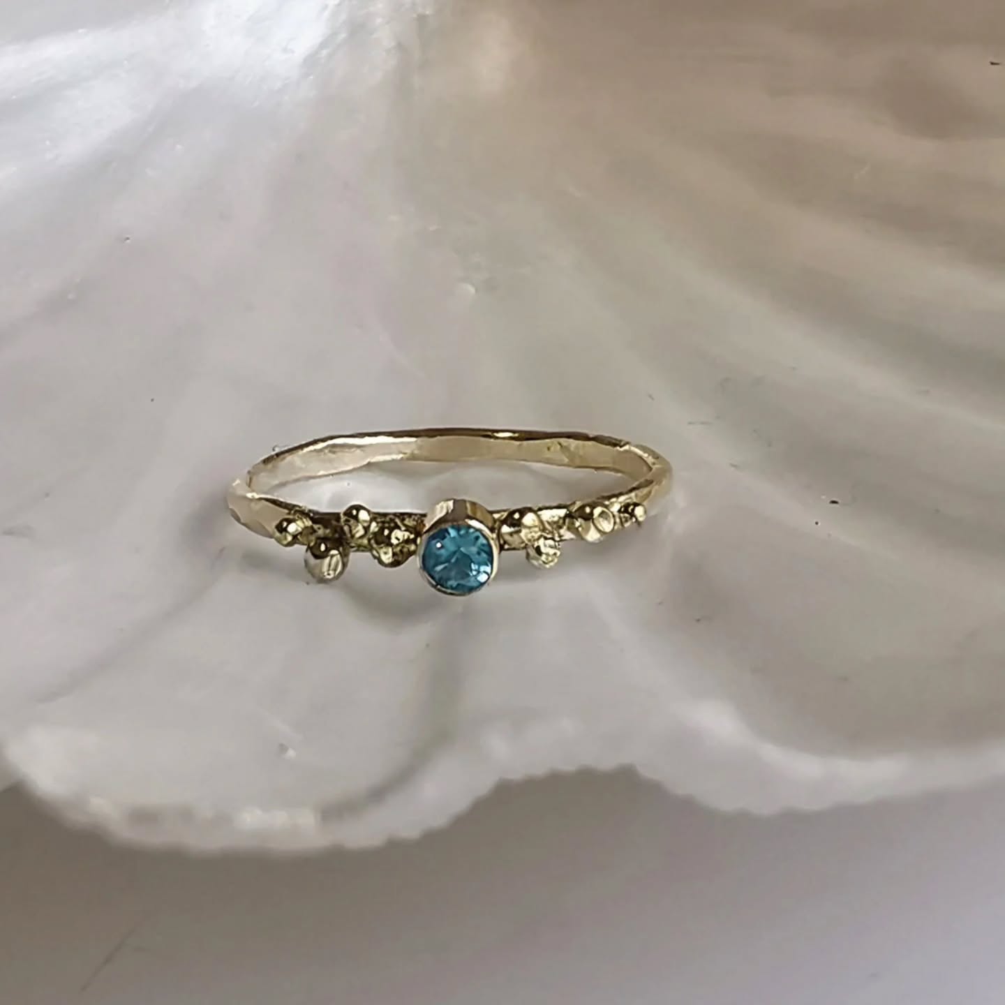 The Seaspray ring in 9ct gold with a gorgeous blue topaz 🌊🫧
#jerseyci
#oceanring
#oceaninspiredjewellery
#jewellerywithmeaning
#MeaningfulJewellery
#seaspray
#inspiredbythesea
#handmadejewelleryuk
