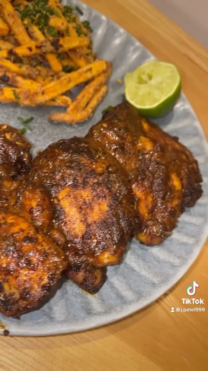 JP SIGNATURE CHICKEN 🍗
———————————————
1. Begin by marinating 4 chicken thighs in 1.5tbsp tandoori powder, 1 tbsp curry powder, 1 tspn smoked paprika, 1 tspn mixed herbs, 1/2 tspn cayenne pepper, 1 tbsp garlic granules, 1/2 tspn black pepper, 1 tspn cumin coriander powder (dhana jeeru), 1/2 tspn oregano, 1/2 lime juice, 1 tbsp honey (add more if you like it sweeter), 1 tbsp sesame oil and 1 tspn olive oil.
2. Give the chicken a good mix to ensure all the seasoning is fully combined.
3. Leave in the fridge for at least a couple hours (overnight is better).
4. Place the thighs in your air fryer on 200 degrees for 15/20 mins depending on your air fryer. (Cut the chicken in half and check if it’s cooked)
5. Lastly, I like to toss my chicken in some peri peri sauce from Nando’s for some extra flavour and then I blowtorch my chicken to give it that Smokey taste that restaurants give lol.
———————————————
#chicken #marinatedchicken #nandos #meat #dinner #recipes #yummy #fyp #instafood #foodporn #tikok