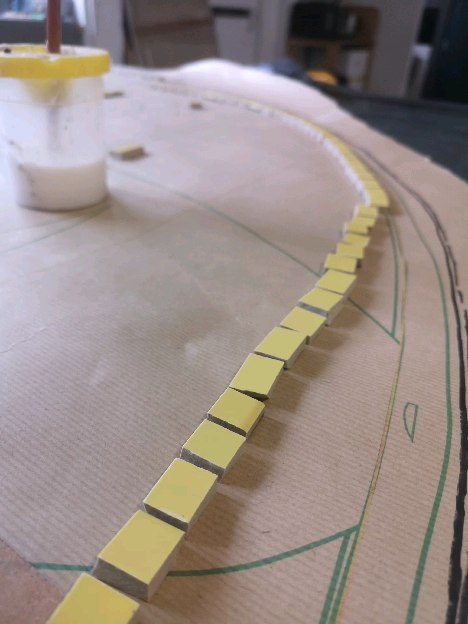 Working with glazed porcelain means that until its finished it all looks pretty much the same colour! By working face down, we ensure we get a perfectly smooth finish when we install our work. Also that big reveal when the paper comes off - never gets boring!
#glazedporcelain #porcelainmosaic #fishmosaic #mosaicwip #artwip #cuttingtiles #mosaicfish #gardenmosaic #gardenfeatures