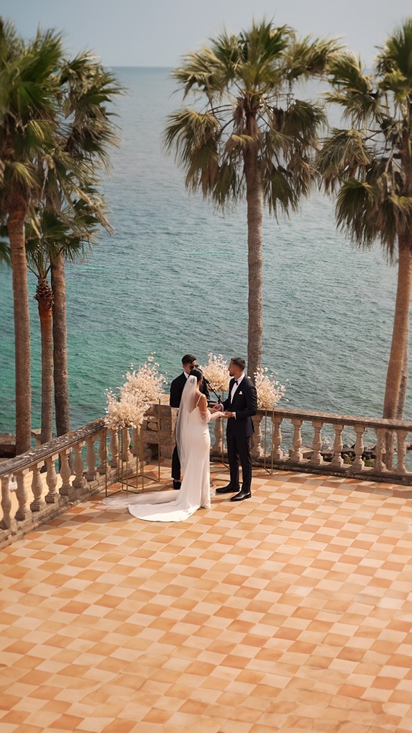 I need you more than life
You really know you love someone when the mere thought of a life without them drains the colors from our world.
This profound truth holds dear for Nat and Erik. Since they met by chance in New York, they traveled the world together and found the perfect place to proudly share their feelings and celebrate life with their loved ones during a week-long holiday.
Their vows made their own lyrics and singing “You are the best thing” they danced hand in hand into forever.
Starring: the one and only @natpedrayes and @erikpeds
MUA @zima_mua
@weddingsbyrebeccaspendlove
Dress @verawangbride
Deco @otrocantardecoracion
Venues @cansimoneta @portverdevents
Music @lucaschitodj
Food @totapunteventscatering
Photo @alejandro.crespi
Lights deco the_balearic_lighthouse
WP @ritualmallorca