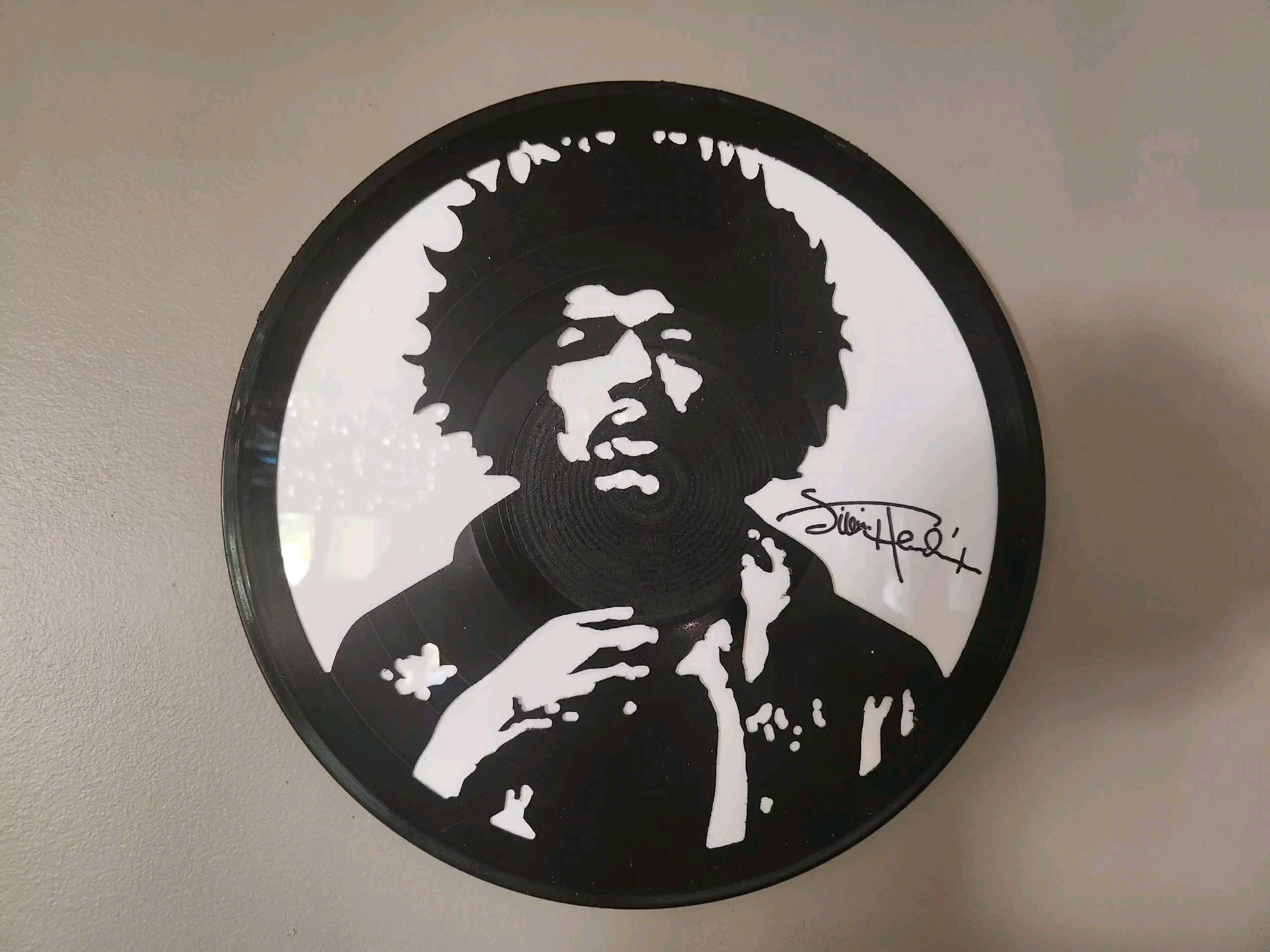 I added a white background and an engraved copy of jimi's autograph
