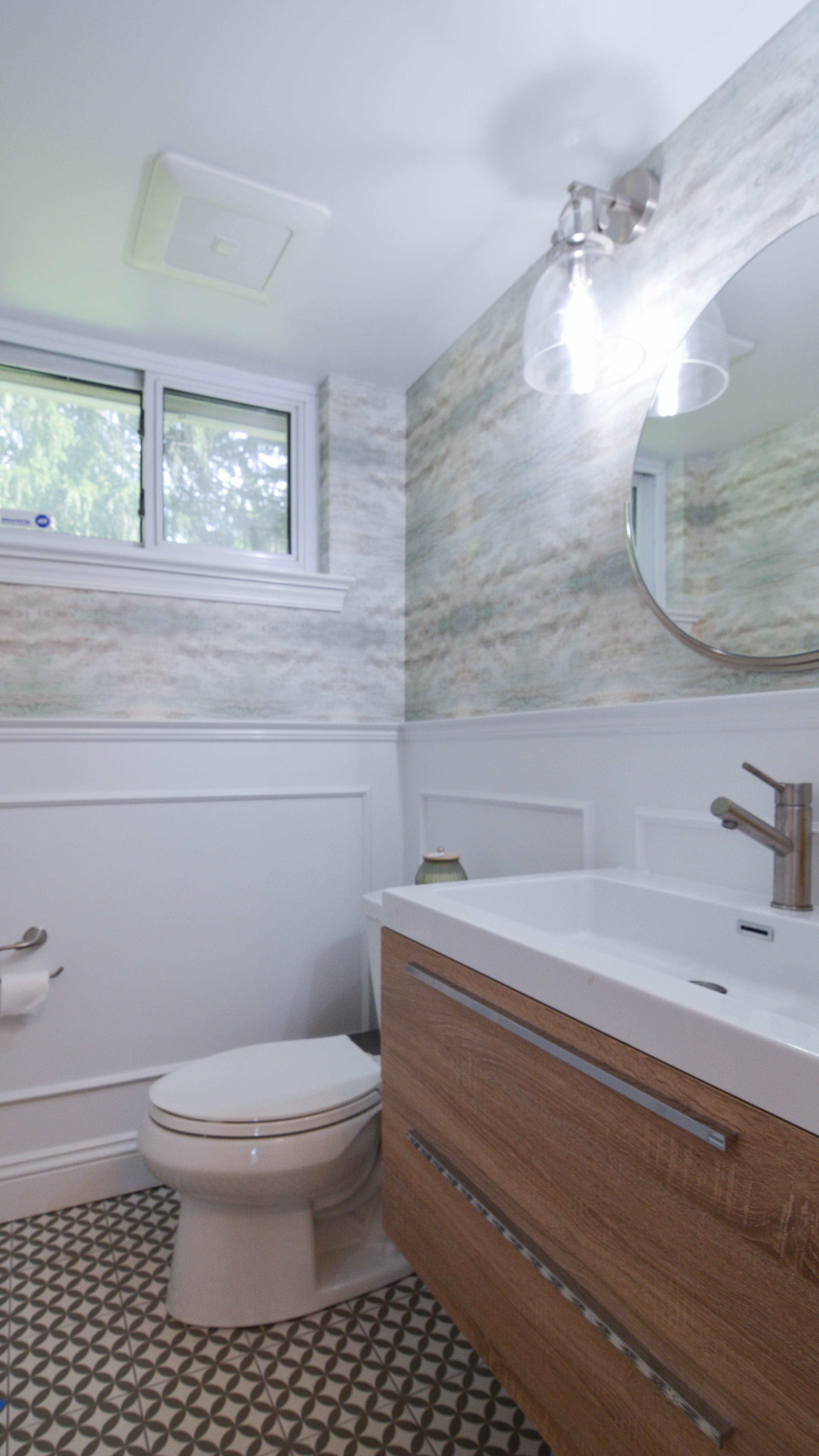 Have a little fun in a powder room bc👇
It’s a smaller space, so you can pack a punch with colors and patterns without it feeling overwhelming.
And since it’s the bathroom that’s accessed by guests, it’s a great place to show off your personality!
#powderroomdesign #bathroomfloor #bathroomwallpaper #wallmoulding #powderroomdecor