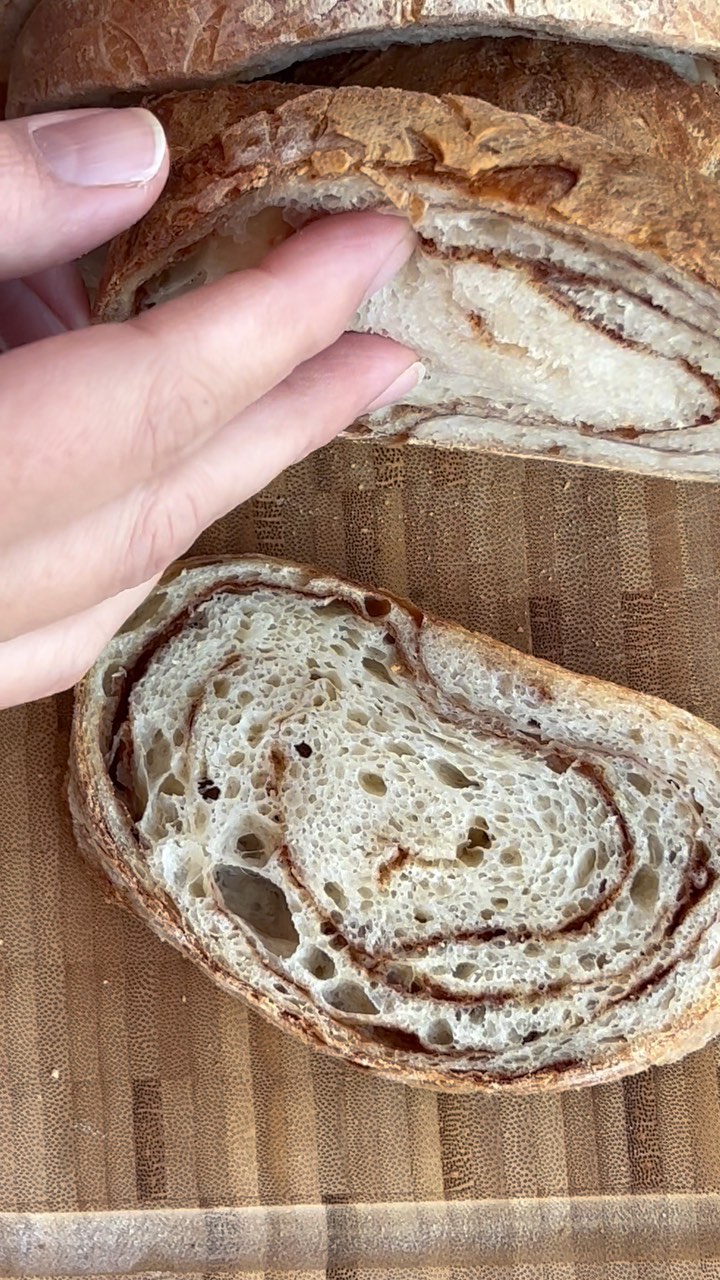 Cinnamon swirl sourdough from the same dough that wasnāt meant to be a focaccia.
Have you had days where things got progressively worse for you? Well, this was definitely one of those times š I was cutting it way too close for a work call, had a clingy child with fever AND a dough that looked way too overproofed. I decided against dusting flour prior to scoring and had to score blindly because I couldnāt see what I was doing (plus I was paranoid about the sugar seeping out!) 15 minutes into baking, I accidentally turned the oven off instead of lowering the temperature because of all the multitasking but mostly from lack of caffeine. By the time I realized what I had done, the bread looked baked and the internal temp seemed fine. I wasnāt surprised by the bit of gummy looking bottom when I cut into the bread. The rest of the crumb was decent and there even was a little bit of aš.
I was inspired by lovely Nusrat @sabzi.shabzi You make it look SO easy but I wonāt give up and will make you proud one day šš¤š¼
#cinnamonswirl #cinnamonswirlbread #sourdough #baking #bakingvideo #bakingfromscratch #bread #sweetbread #cinnamon #homemadebread #breadvideo #breadreels #breadsofinstagram #sourdoughofinstagram #naturalleaven #levain #levainbread #breadhead