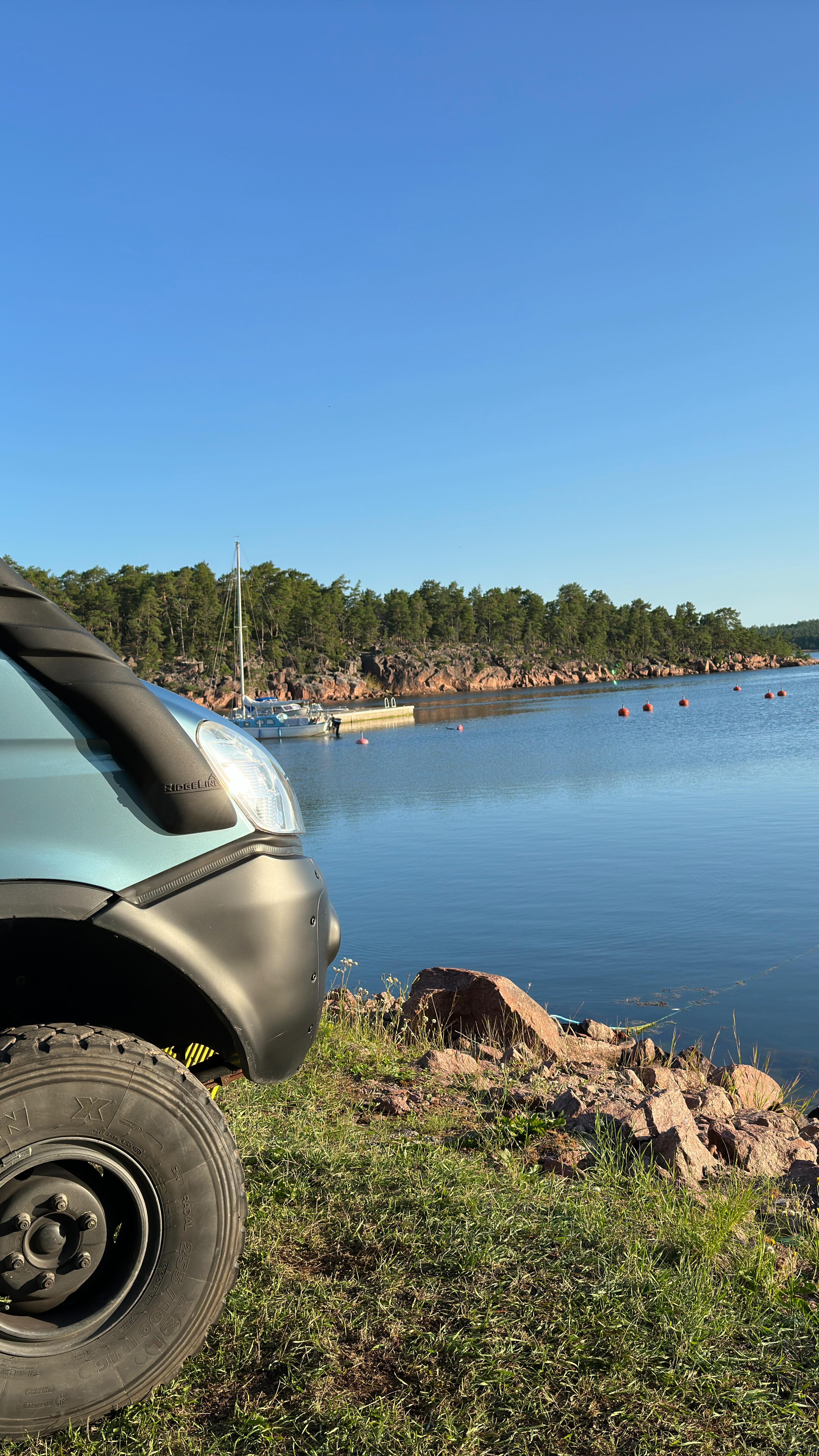 The island of Åland, Finnish but they speak Swedish. Three days - the tall ships races, two bike rides and an amazing camping spot.