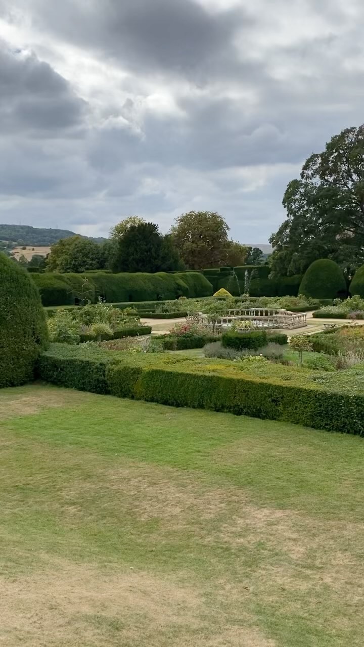 Sudeley Castle’s main claim to fame is probably that it is the resting place of Catherine Parr the final queen to have to marry Henry VIII.
The castle also has a long royal history with various monarchs owning the place before or while they were monarch.
Like many castles it was slighted during the 1600s by Oliver Cromwell and Parliament in order to make it indefensible and yet enough survived to be restored in the 1800s and the resultant rebuild plus the ruins and the ambitious gardens make for some glorious views around the grounds.
For me the draw was Catherine, now I have visited the graves of all six wives, but I was drawn into Sudeley’s stories and I’m looking forward to my next visit.
Just for you real castle fans though: no, it doesn’t feel like much of a castle today but it still has a few features, such as the dungeon tower, that recall its use as a truly defensible site.
•
•
•
Hi I’m William Harry Mitchell, a Blue Badge Tourist Guide and Historical Interpreter. I lead tours around London and all over England. Want a tour? Have a look at my website (link in bio) for some ideas and get in touch through the contact form. @whmtours #sudeleycastle #sudeley #castle #waterfeature #garden #englishgarden #henryviii #katherineparr #tudorhistory #history #richardiii #outside #ruin #guide #bluebadgeguide #tour #tourguide #touristguide