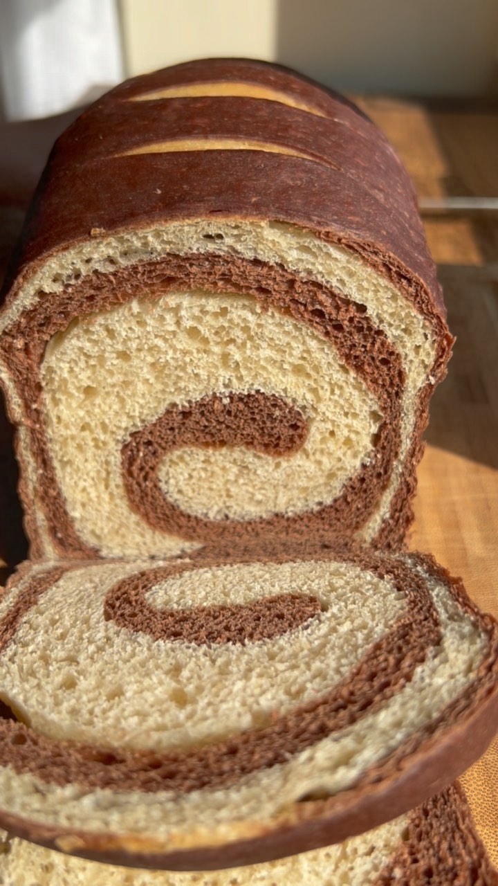 Calling this one sourdough swirl loaf. I almost made this a sweet bread but then decided against it at the last minute. I feel like thereās so many sandwich options when the bread isnāt sweet. Used a stiff starter for this loaf. We are on day 4 and itās still soft!
#bread #sandwichbread #tinloaf #swirlbread #wildyeast #naturalfermentation #fermentation #chocolateswirlbread #baking #breadbaking #homemadebread #softbread #breadvideo #homebaker
