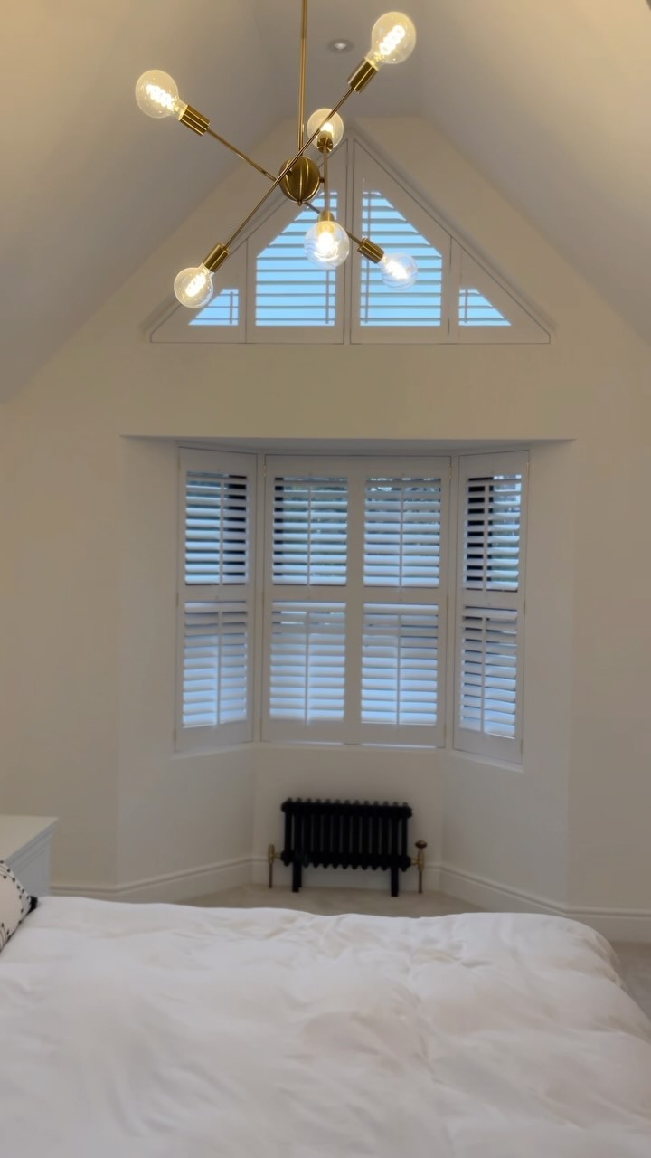 Wow, what a beautiful cosy bedroom. We can make almost any shape you desire with Shutters. Info@indigoblinds.co.uk
01787 275249 Call for a free estimate