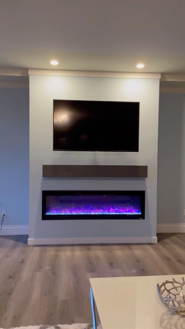 Custom fireplace built in and custom made mantle. 👌 #residentialrenovations #residentialconstruction #homeimprovements #homerenovations #customfireplace #custombuiltin #custommantle #langleycontractor #langleyconstruction #abbotsfordrenovations #abbotsfordcontractor #abbotsfordrenovations #fireplaceinstall #drywallfinisher #drywallrepair #woodframing #woodframer #woodworking