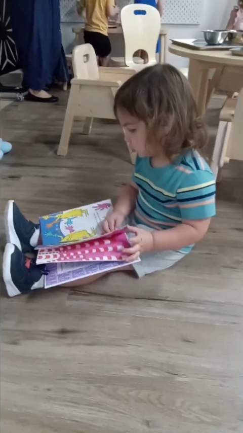 Our morning fun. We played dress up 🚨 and read books! 📚 and we painted with WHITE for Yom Kippur.