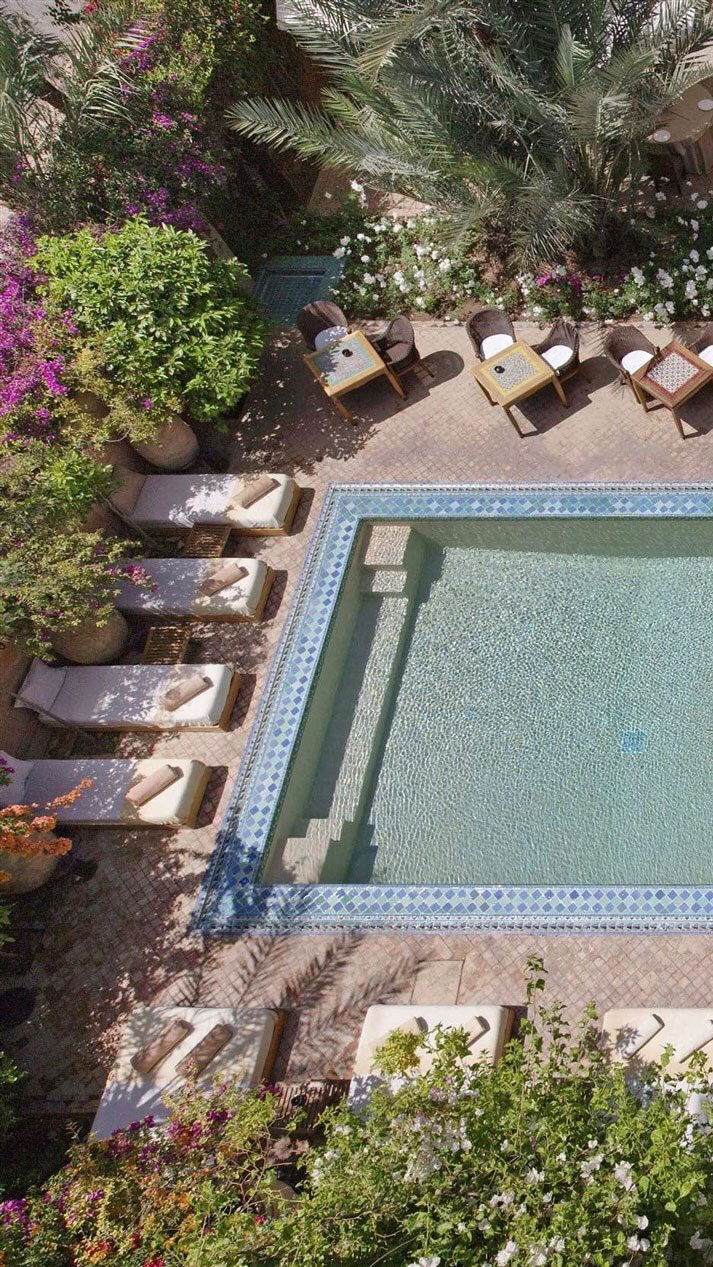 Afternoons by our pool... ✨ Do you prefer swimming or lounging in the sun? Our guests always seem to indulge in a little of both. 😎 You can also enjoy food and drinks served here. 🧡
#marrakech #morocco #riad #marrakechriad #marrakechvibes #beautifulhotels #hivernage #topworldhotel #weekend #pooldecor #worldofinteriors #wintersun #weekendgetaway #botanicaldaydreams #outsidein #darrhizlane #poolparty #pooltime #poolday #poolsidevibes #marrakechbynight