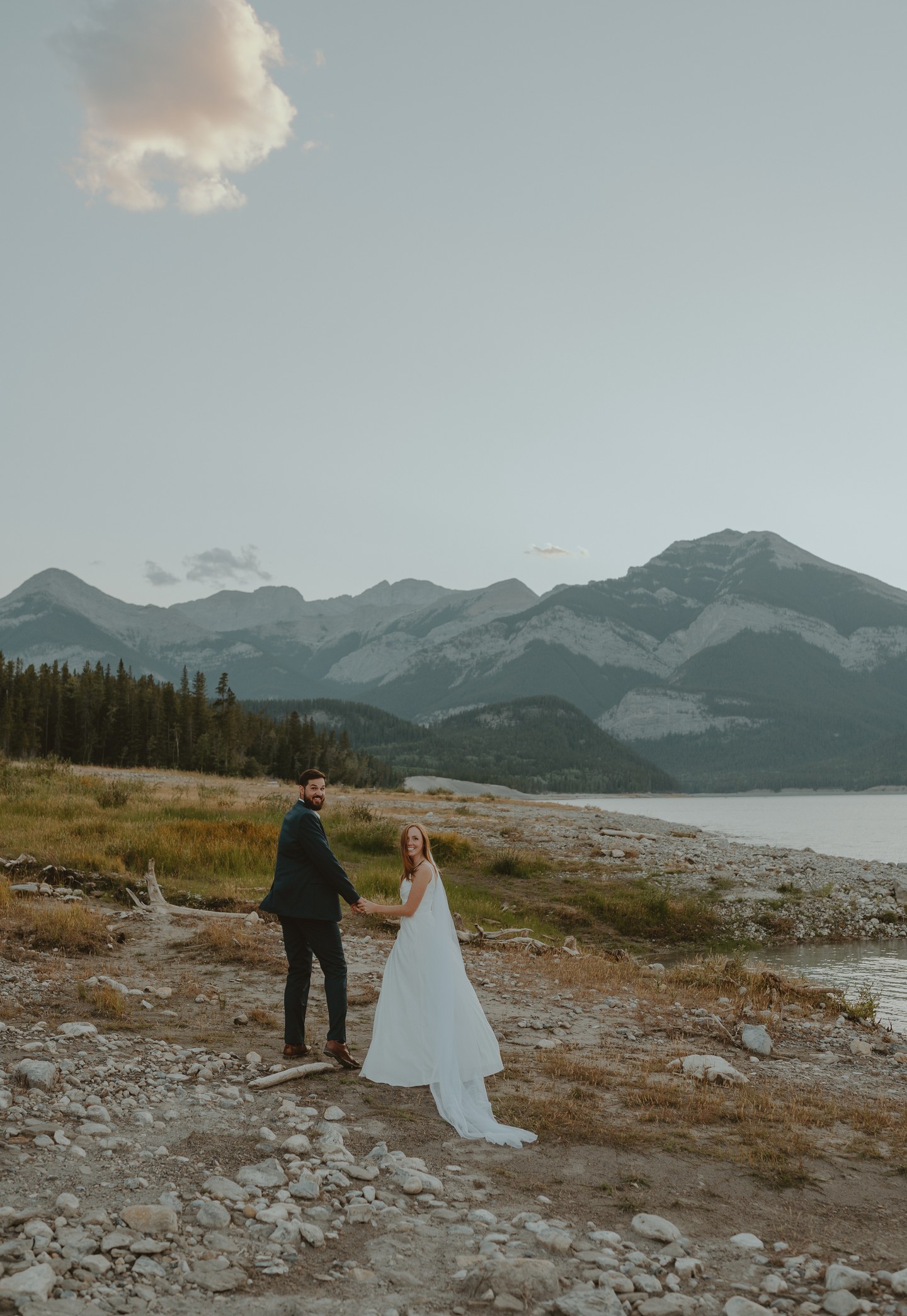 If you're planning any type of session this summer, you're going to want to see this.
On a warm summer evening in August last summer, Jessica and Hal ventured to meet me at Barrier Lake to celebrate their engagement in an intimate and personalized way. The stunning glacier lake provided the perfect place for their elopement-style session, as the waves gently rolled up on the rocks, and the wind blew through the grass, creating a quiet setting to settle into one another--- see their entire session on the blog.
Link in my bio to the most recent work to melt into.