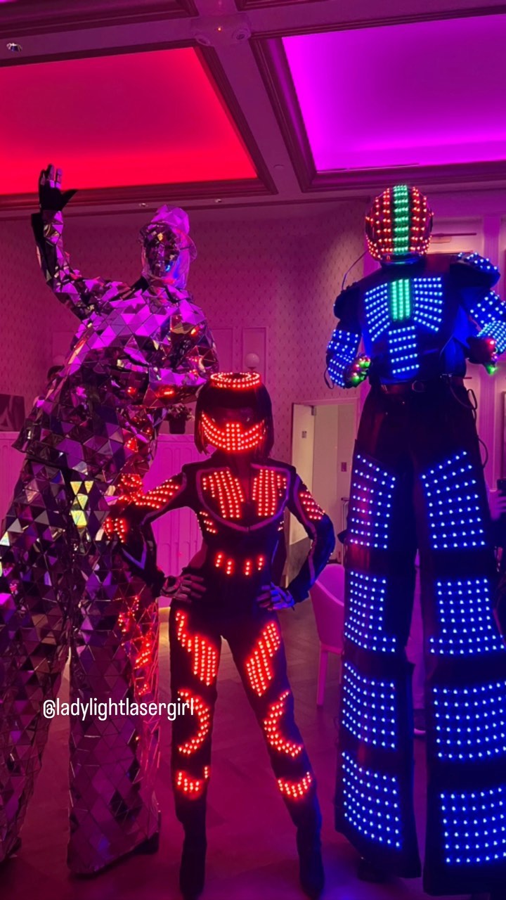 Fun event last night with LED and mirror talent for a tech company. #talent #led #dancers #stiltwalker #futuristic #scifi #neon #glow #mirrorman #ledrobot #ledrobotgirl