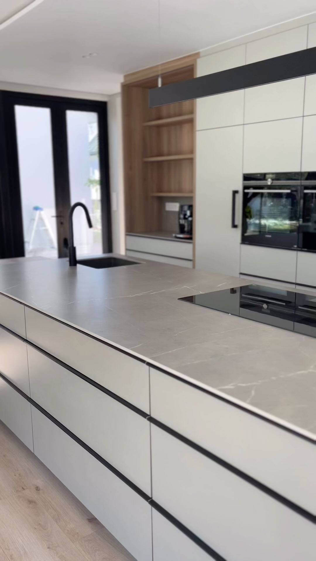 TORTORA TAFU
The spotlight is on this spacious, modern, Scandinavian-style kitchen nestled in the heart of a home in the breathtaking Val de Vie Estate.
This kitchen features a beautifully designed, central island and prep area in 12mm Tortora Tafu with a seamlessly mitred waterfall leg on one side and a perfectly integrated nook area in oak.
The light grey tone of Tortora Tafu provides a neutral colour palette that effortlessly combines with both cool and warm elements. Tortora Tafu features grey nuances in it’s base with fine, white inclusions making up the veining - all providing the freedom to experiment with combinations of white, grey, black, and beige, and elements of brass, gold, silver or matte black accents.
Tortora Tafu is a perfect fit for this modern home with it’s blend of light joinery on the island and back wall, beautiful oak features and contrasting black accents throughout.
Another clean, modern and sophisticated space created through the master collaboration of:
Spotlight Kitchens @spotlightjoinery
Landman Clift Construction @landmanclift
Louw & Louw Architects @louwarchitects
Rock&Stone @rockandstoneworks
SA Stone Studio @sastonestudio
Well done to all involved