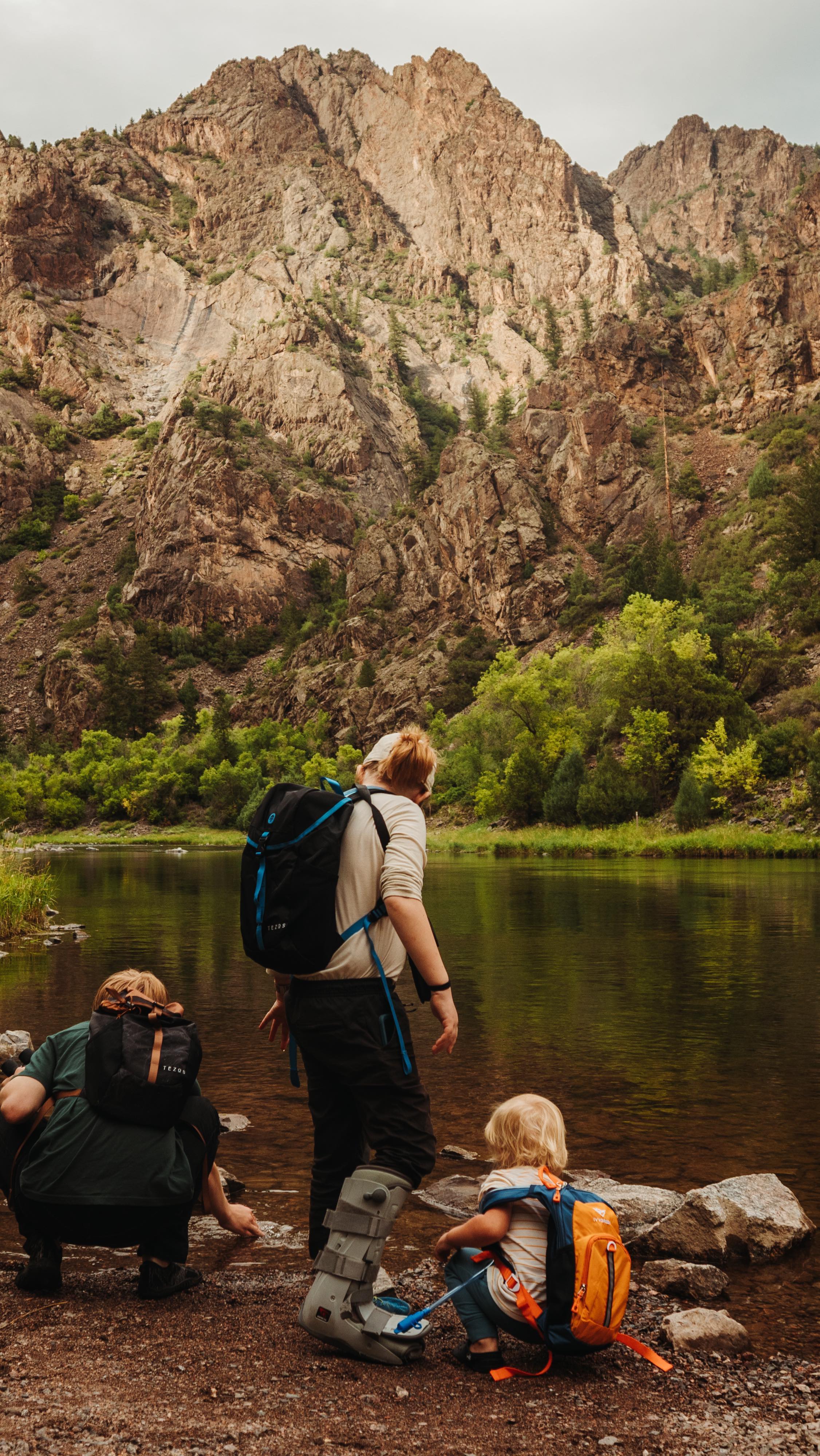 Here’s what nobody is talking about when it comes to Black Canyon of the Gunnison: East Portal is magical. ✨
Although technically outside of the national park, we found East Portal to be a magical place away from the hustle & bustle of the canyon’s South Rim. We drove our truck down East Portal Road (steep, windy but totally worth it) to a sort of tranquility that we weren’t expecting.
History:
East Portal was created during the construction of the Gunnison Tunnel and the town was built to support the construction. Built between 1905 and 1909, the Gunnison Tunnel was built to move water from the Gunnison River to the Uncompahgre Valley to provide vital resources to the communities within the valley. Today, there isn’t much remaining of the town or the tunnel, but you can still explore this area below the rim without a permit.
Things to Do:
✨East Portal Trail: Hike an easy trail along the Gunnison River that begins at the East Portal Campground and follows the riverbank. Great for littles! Did you know river otters call the Gunnison River home, too?
✨Crystal Dam: Crystal Dam is one of three dams that help regulate the flow of the Gunnison River through Black Canyon. We found the information boards helpful to understand why the dam was built and the role it plays in the Black Canyon ecosystem.
✨ Picnic by the River: We packed a picnic, sat by the river and simply soaked in the sights and sounds. It was truly one of my favorite activities. So simple, yet so powerful to be present in the moment. We enjoyed watching the anglers and kayakers in the river.
When you visit Black Canyon of the Gunnison, it is well worth your time to head down to East Portal and experience the true magic of life at the bottom of the canyon.
📍East Portal | Access from the South Rim of Black Canyon of the Gunnison National Park, entrance fee required
Did you know that you could explore this park from the canyon’s edge AND at the bottom along the Gunnison River?
Follow us @wherewildonesroam for exploring national parks with kids, family-focused guides and going on epic adventures together as a family!