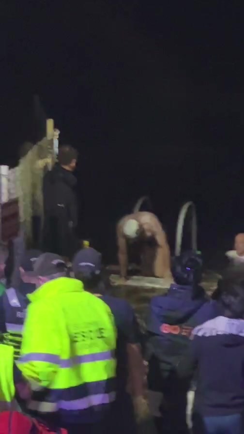 Neal’s arrival from the world record swim.