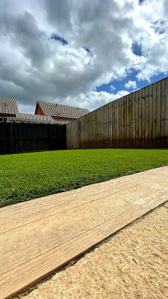What a transformation! Just in time for those relaxing summer evenings.
This was a fantastic project executed by Pritchard Property Services. We started by removing the old lawn, then laid a membrane to prepare the area. Next, we installed a Type 1 MOT base followed by sharp sand. Finally, we completed the project by laying down the new grass.