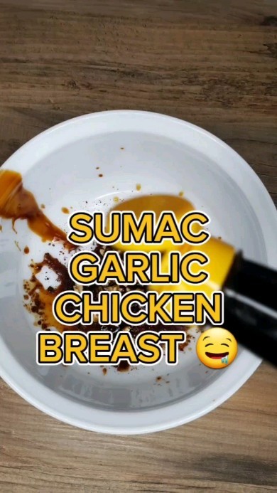 SUMAC-GARLIC CHICKEN 🍗🔥:
This recipe comes in two parts, but no worries if you don't have the extras on hand:
1-Start with sumac, and feel free to add a bit more for that fantastic zesty and floral aroma.
2-Sprinkle Aleppo pepper for a touch of earthy flavor. If you don't have Aleppo, any chili crush or powder will do.
3-Add minced garlic.
4-Season with salt, olive oil, and water.
Note: If you don't have tamari, soy, fish sauce, and pomegranate molasses, you can skip them. The chicken will still be delicious and moist. (add more salt if skipping additional ingredients below.) Just let the chicken breasts marinate in the fridge for a few hours.
5-Add tamari (I used @momofukugoods brand), soy sauce, fish sauce, and pomegranate molasses for extra depth and flavor.
6-Ensure each breast is thoroughly coated in the marinade for even flavor absorption.
7-Roast in the oven at 170°C for at least 35-40 minutes.
8-Get ready for your new favorite chicken!