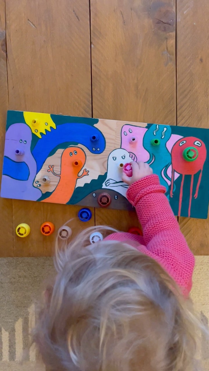 Had a little weekend craft project.
Jolene’s probably played more with empty food pouches than her toys. After watching her screw and unscrew the tops 100 times we thought we’d start collecting them and ended up with quite a colourful little selection.
We fitted a few pouch nozzles to a wooden plank and painted some quirky characters on it.
And I can tell you, it’s been quite a success! As she fits the right coloured nose on the characters, she’s getting her motor skills up and learning about colours… + these parts are totally safe for children, as they were originally designed for them.
What do you think?
Would your toddler like that?
Thank you @bask_in_the_north for helping me build it ;)
#craftproject #childrensillustration #craftyourowntoys
#upcyling #upcyclingideas
@mylittlepiccolo @ellaskitchenuk