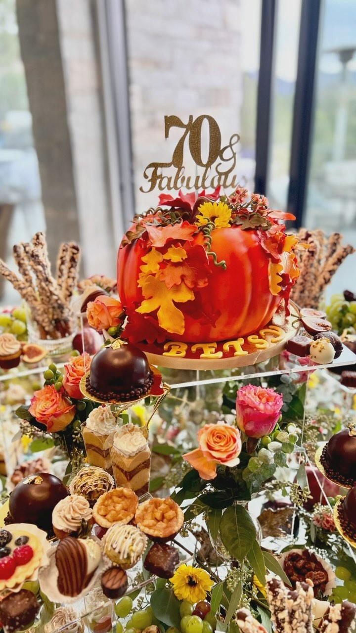 🎉✨ Before we dive headfirst into Christmas cheer, let’s take a moment to celebrate an unforgettable HARVEST PARTY hosted by the fabulous Judy Bollweg at her stunning home at The Rim! 🍂🏡 This annual tradition is not just a gathering; it’s an experience filled with laughter, love, and, of course, delicious food!
Judy is truly the hostess with the mostess, serving up a feast that dazzles the senses! From exquisite cocktails, a variety of foods, live music, and of course dessert!Every detail was perfection. 🎶🥂 And how sweet was she to dedicate the handmade pumpkin harvest centerpiece cake to her best friend, Betsy, who turned the big 7-0 that weekend? Happy Birthday, Betsy! 🎂🥳
The centerpiece cake was a heartfelt nod to their shared memories of growing sunflowers together 🌻, with those bright blooms adding an extra touch of warmth and nostalgia. 🧡💛
We had the pleasure of crafting an impressive array of 200 made-from-scratch mini desserts to wow Judy’s guests! 🌟 Highlights included a rich chocolate mousse bombe (Judy’s personal favorite!), creamy pumpkin cheesecake shooters with a ginger snap crust, our beloved KCB spiced nuts, zesty lemon tarts, a delightful assortment of classic cookies and shortbread bars, fresh fruits and chocolates!
And let’s not forget the star of the night—the harvest pumpkin cake! 🍰 A caramel apple walnut creation adorned with handmade, edible decor that left everyone’s taste buds dancing!
Thank you, Judy, for letting us be part of this magical evening! We can’t wait to whip up more culinary delights for your next soirée! 💖🎊 #HarvestParty #HostessWithTheMostess #FoodieFun #CelebrateFriendship #HappyBirthdayBetsy #paysonazbakery #kendras_country_bakery #edibleart #fall