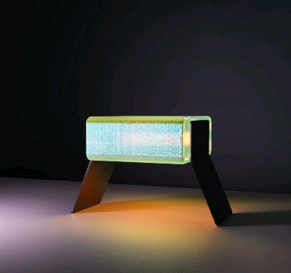 "Table Lamp" - OttesonDesign
The "Table Lamp" is a small portable lamp that pulls its inspiration from the Melt Cone Portable Lamp and the Press Shere Pendant. I designed this lamp as a part of a three-piece collection I am submitting for the ReImagine design contest. It is designed to be as simple and beautiful as possible while maintaining the high design standard in Tom Dixon's Lighting profile.
The "Table Lamp" features a solid block of multi-optic dielectric glass held together by two folded aluminum legs. The legs are connected by bolting into an internal aluminum span, squeezing the glass between themselves. The aluminum span not only provides the strength and rigidity of the lamp but also houses the electronics, LiFePO4 battery packs, and the LED tube light. The aluminum span also acts as a modern lamp shade by blocking the light internally, forcing it upward and downward out of the lamp. The "Table Lamp" has a hidden USB-C charging port that allows you to disconnect it and use it anywhere light is needed!
The "Table Lamp" is a compact and visually exciting piece with a unique contemporary feeling. It is designed to be easily manufactured using familiar and inexpensive techniques.
#dbxtomdixonxvisune
#lightingdesign #ottesondesign #designerlife #industrialdesign #desklamp