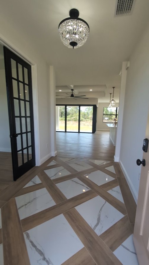 This house screams "home" from the layout, to the beautiful tile selections, and the finishes. Home is right where our customers are, we were so happy to deliver this custom home to them ♥️
#qualityhomesofpc #swflhomebuilder #customhomebuilder #qualitybuilt #portcharlottefl #over30yearsexperience #charlottecountyfl #finishedhome #customtilework #quartzcountertops