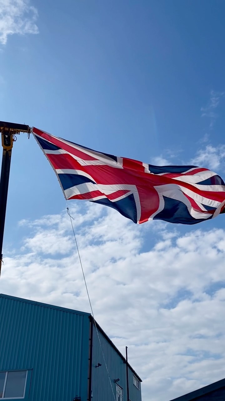 Raising the flag for the 80th D-Day Anniversary.