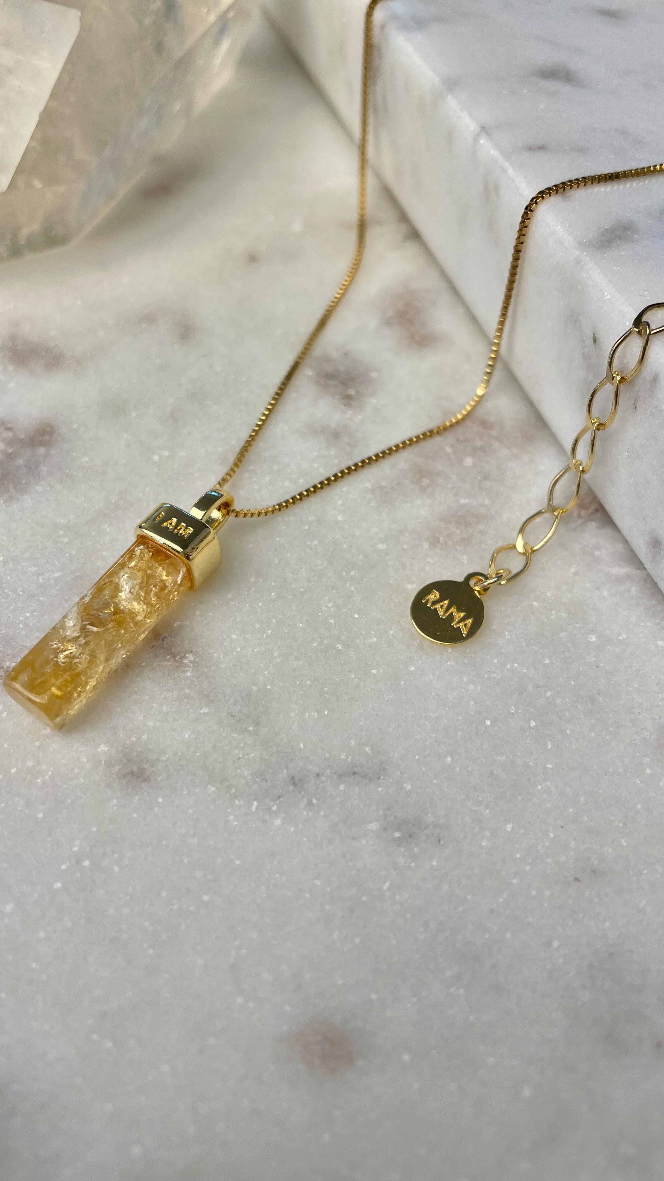 Imagine having the energy of the sun radiating on you?
✨I Am necklace !!! RESTOCK ✨
Did you know that Citrine carries the solar frequency with it. Activate your solar plexus by feeling the energy of the Sun. It warms, comforts, penetrates, energizes and gives life. Working in the 3rd chakra, the solar plexus, it is a strong emotional balancer, dissipating tensions and depressions, calming and relieving disturbance conditions and removing emotional blocks, seeking our desires and moving us.
I AM necklace made in Brazil - gold plated 18k ! ✨
#citrine #crystaljewelry #healingcrystals